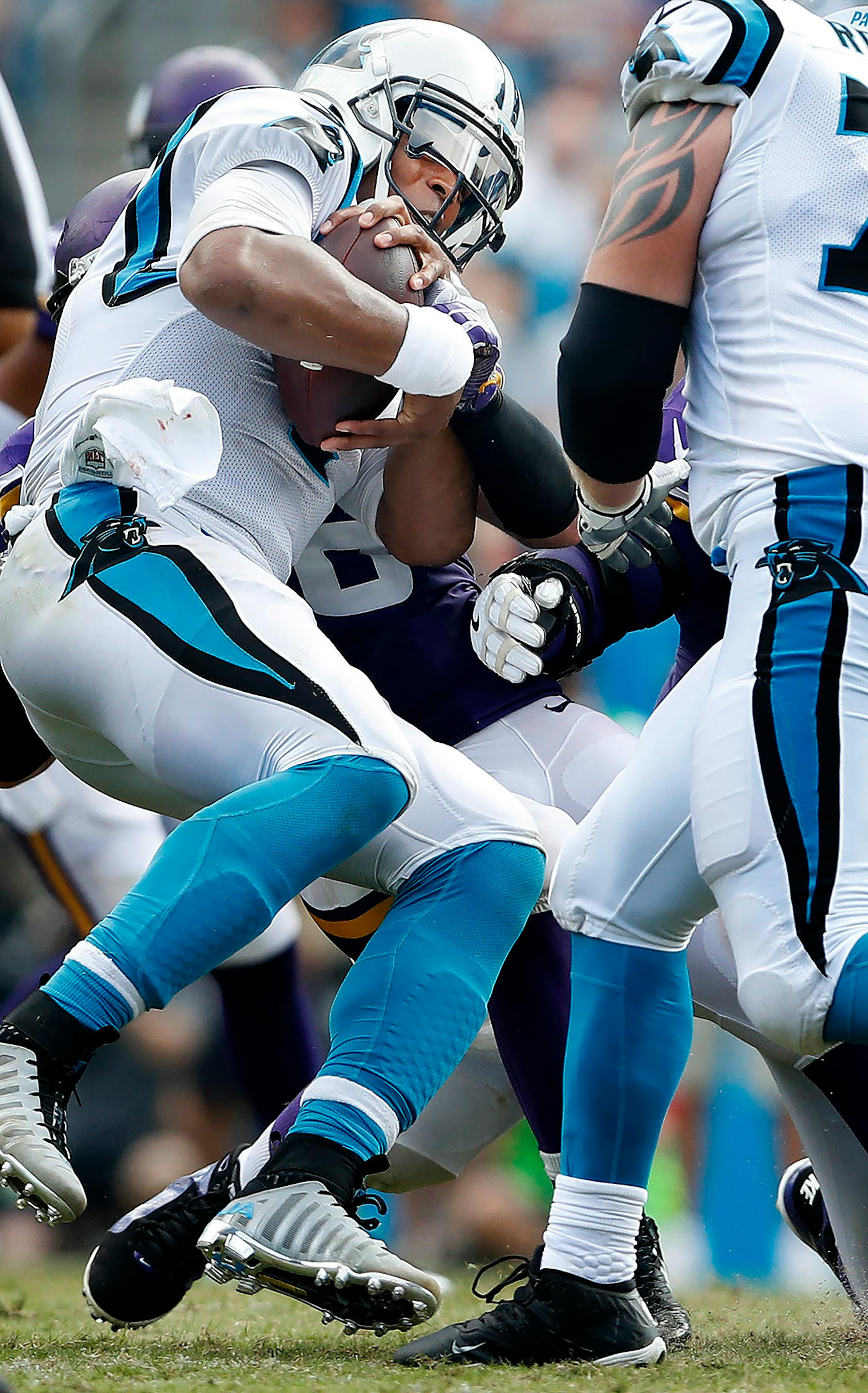 Brian Robison (96) sacked Cam Newton (1) in the third quarter.