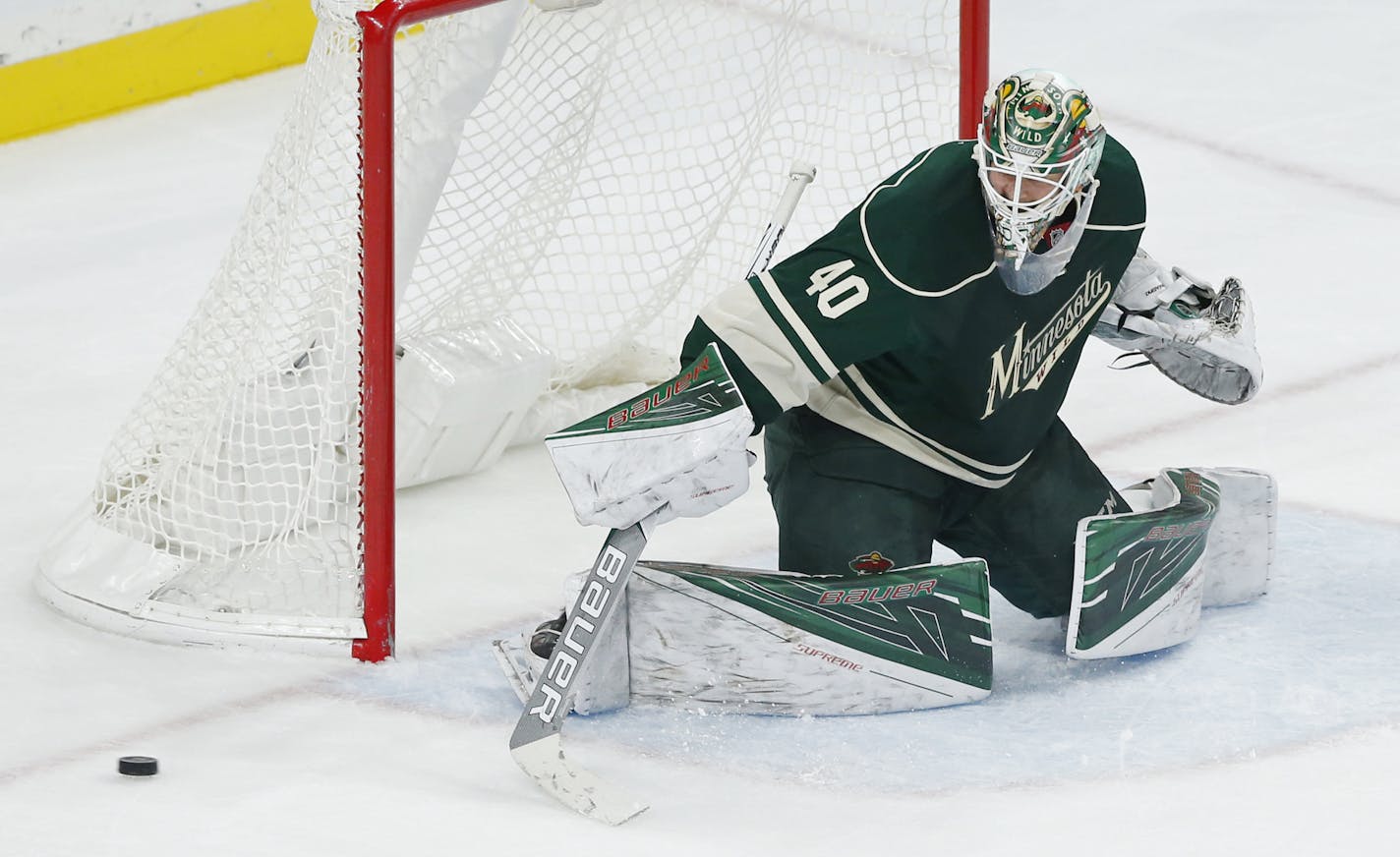 Minnesota Wild goalie Devan Dubnyk defends against the Winnipeg Jets in the first period of an NHL hockey game Saturday, Oct. 15, 2016, in St. Paul, Minn. (AP Photo/Jim Mone)