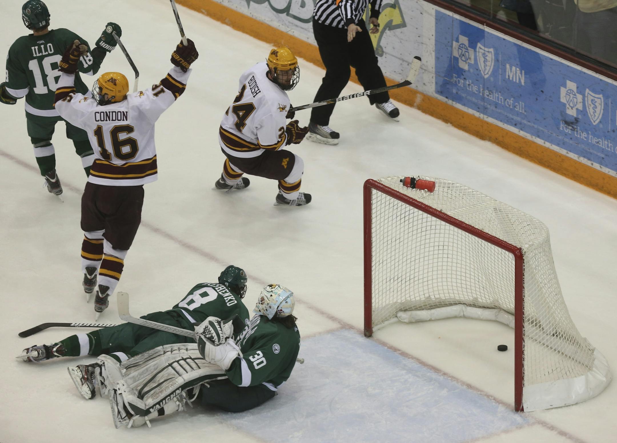Gopher's Nate Condon celebrated after scoring the team's second goal of the game as BSU's goalie Andrew Walsh sat on the ice during the second period at Mariucci Arena in Minneapolis, Min., Saturday, March 16, 2013.