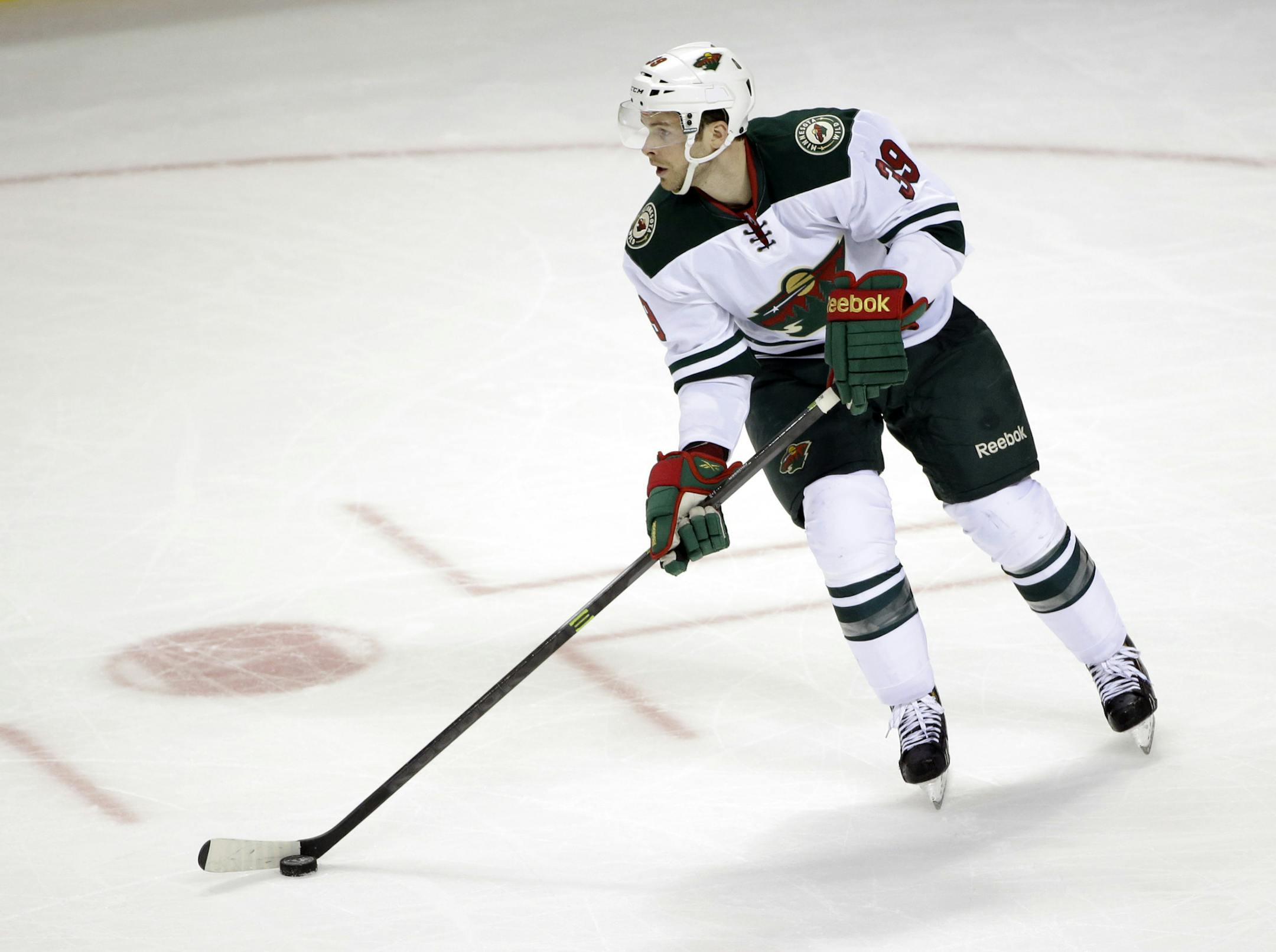 Minnesota Wild's Nate Prosser (39) in action against the San Jose Sharks during an NHL hockey game on Saturday, Jan. 25, 2014, in San Jose, Calif. San Jose won 3-2 in overtime. (AP Photo/Marcio Jose Sanchez)