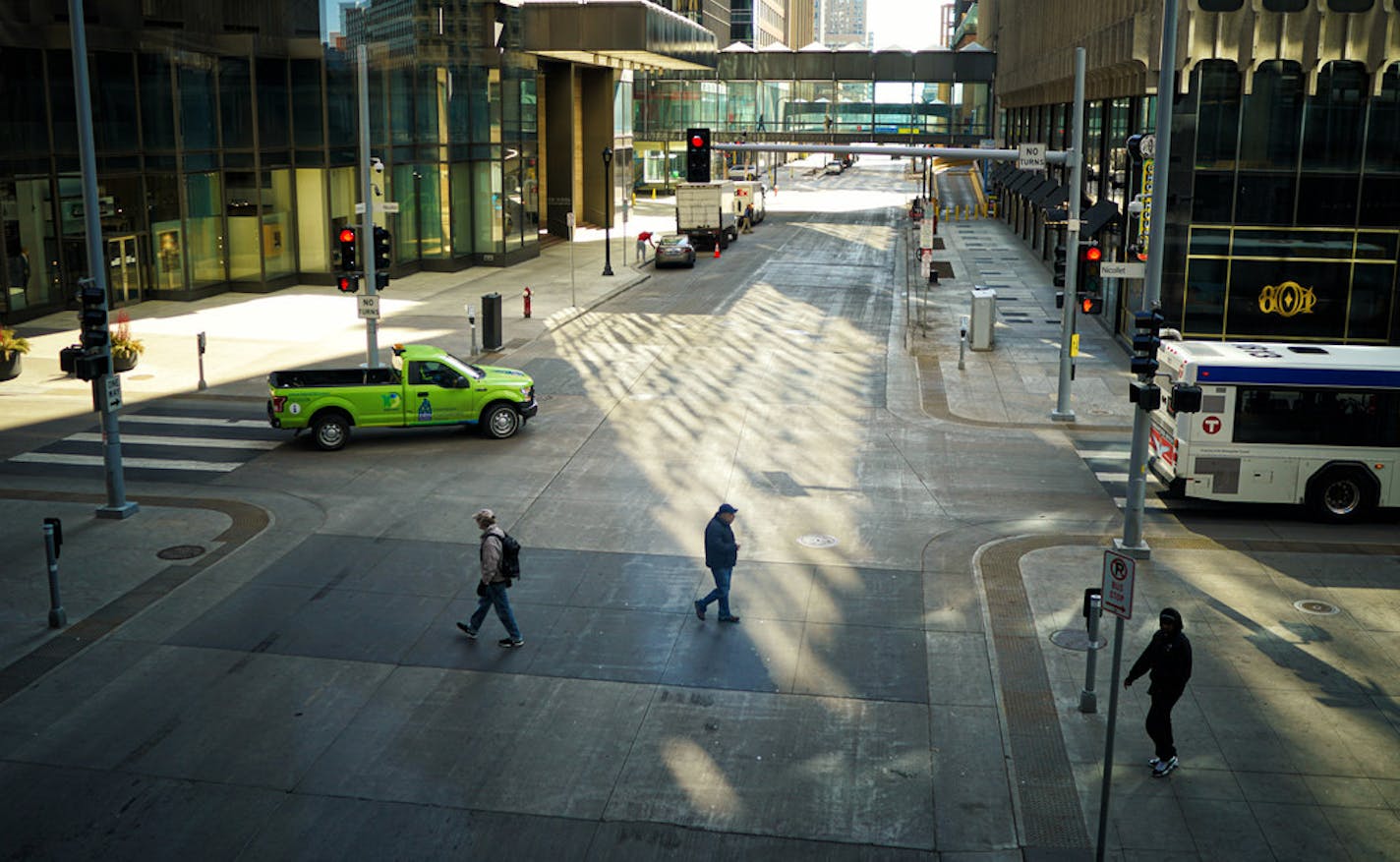 A few people were still moving around in downtown Minneapolis along 8th Street at Nicollet Mall on Tuesday, but nothing near the crowd usually there during the weekday lunch hour.