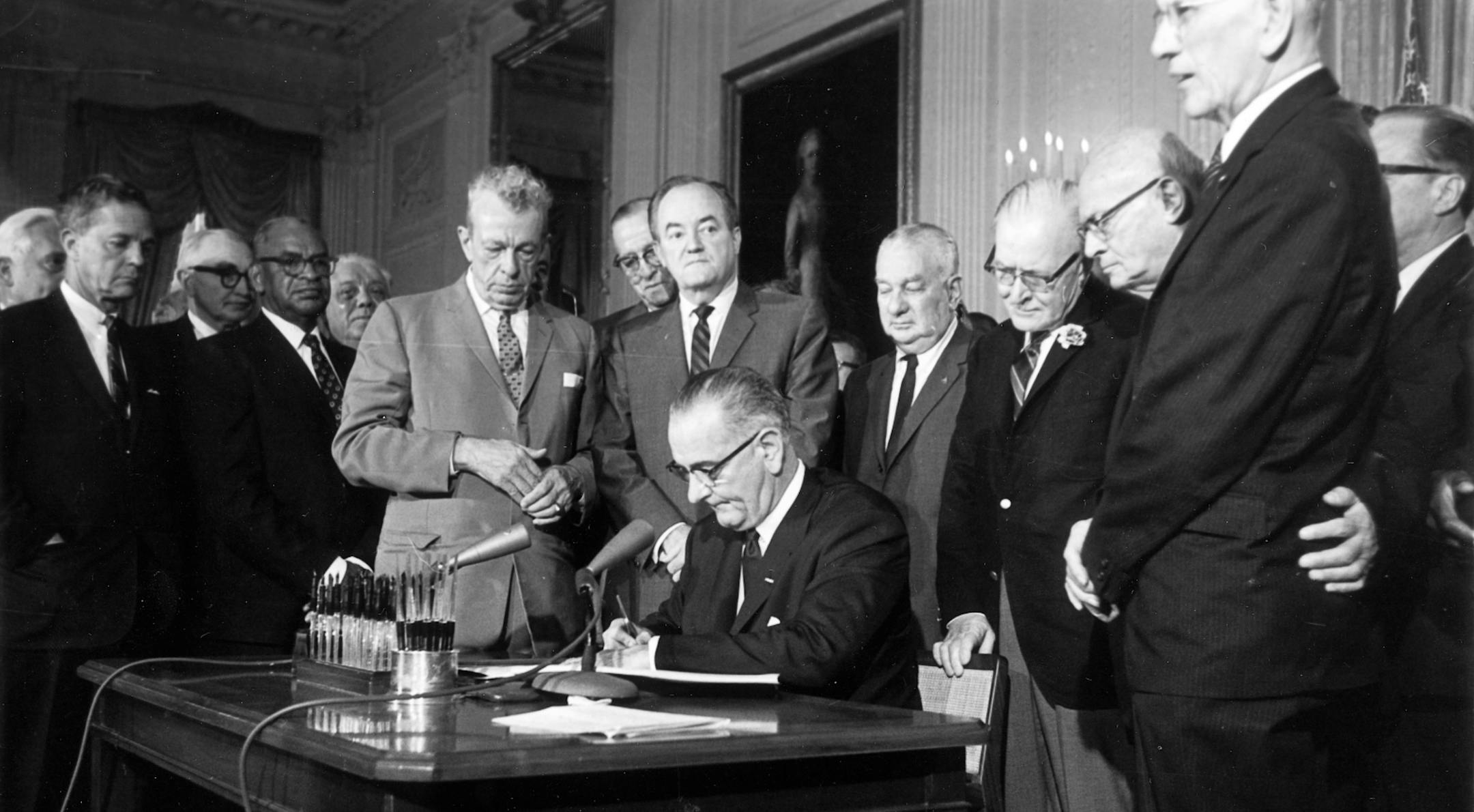 FILE - This July 2, 1964 file photo shows President Lyndon Baines Johnson signing the civil rights bill, in the East Room of the White House in Washington. With Washington mired in congressional gridlock, itís become trendy in the nationís capital to long for the days when LBJ could cajole or strong-arm lawmakers on both sides of the aisle into backing his legislative priorities. Implicit in those bouts of nostalgia is a sentiment that frustrates President Barack Obama and his advisers