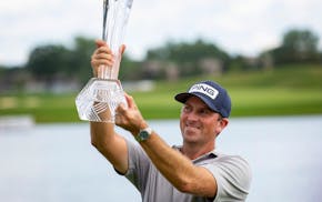 Michael Thompson held up the trophy after winning last year’s 3M Open in Blaine, his first PGA Tour victory in seven years.