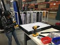 Versare Solutions in Minneapolis, a maker of room and cubicle partitions, has pivoted to making retail and reception room screens as the economy chang