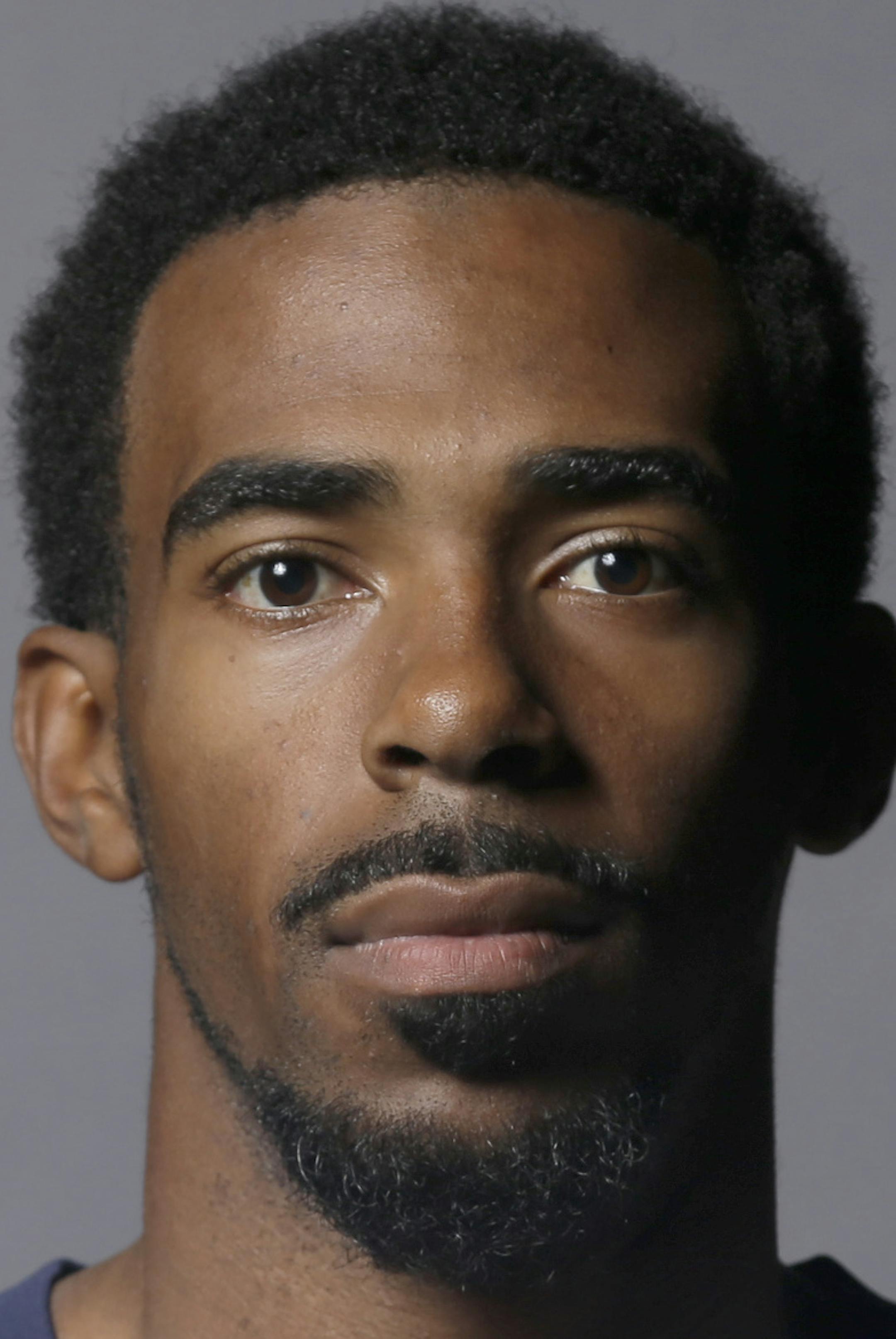 Memphis Grizzlies' Mike Conley poses at the team's NBA basketball media day in Memphis, Tenn., Monday, Sept. 30, 2013. (AP Photo/Danny Johnston) ORG XMIT: OTKDJ108