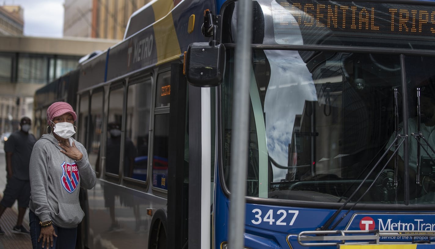 Ebony Yeshua waited to board a Metro Transit bus at 8th Street and Nicollet Avenue on May 18, 2020. Metro Transit is upgrading it's NexTrip planning software to boost accuracy.