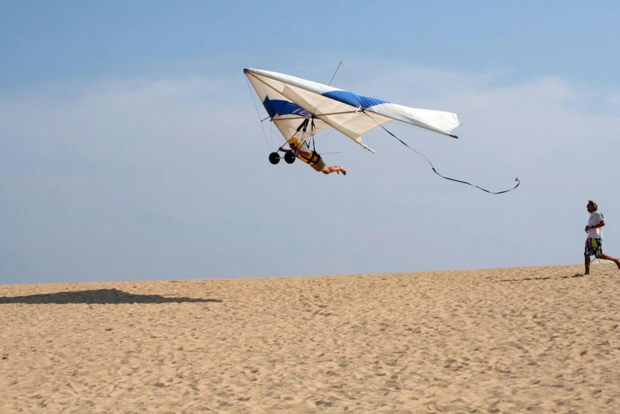 A hang gliding student catches air at Jockey's Ridge State Park in Nags Head, N.C.