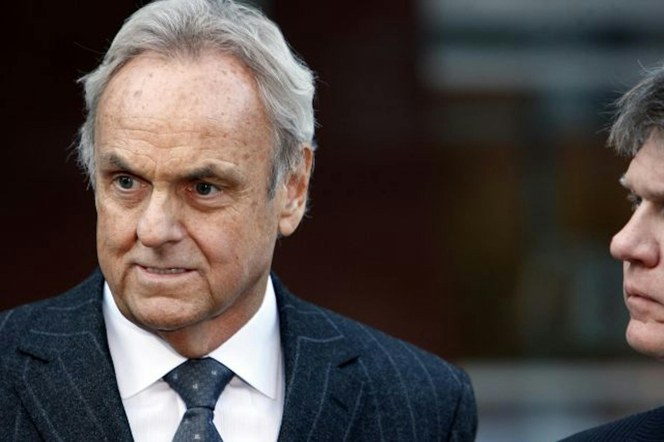 Denny Hecker addressed the media outside of �the U.S. Court House in Minneapolis on Thursday afternoon. Hecker pleaded not guilty Thursday afternoon to federal charges that he defrauded Chrysler Financial Corp.