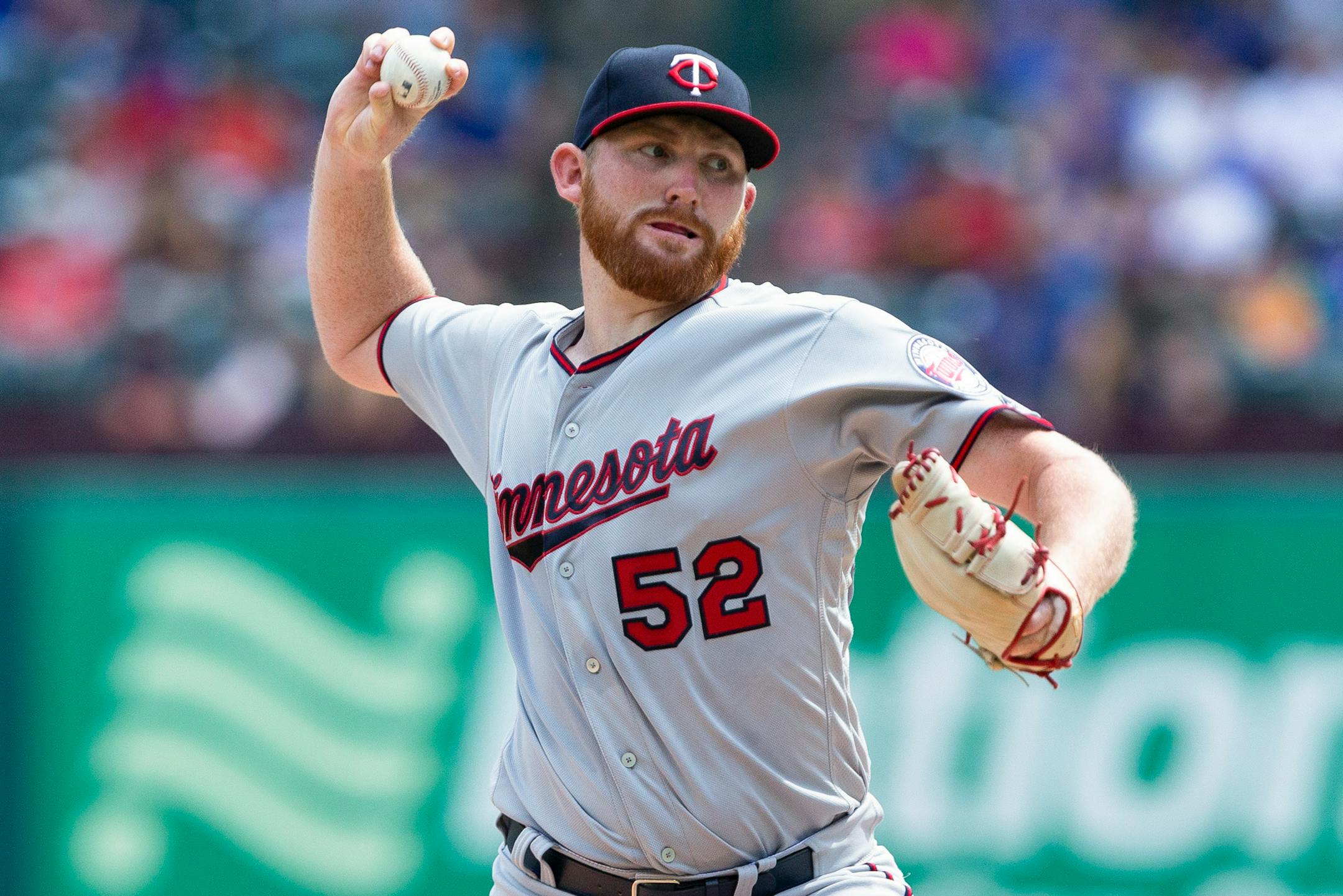 Minnesota Twins' pitcher Zack Littell (52) delivers a pitch during the fourth inning of a baseball game against the Texas Rangers, Sunday, Sept. 2, 2018, in Arlington, Texas. (AP Photo/Sam Hodde)