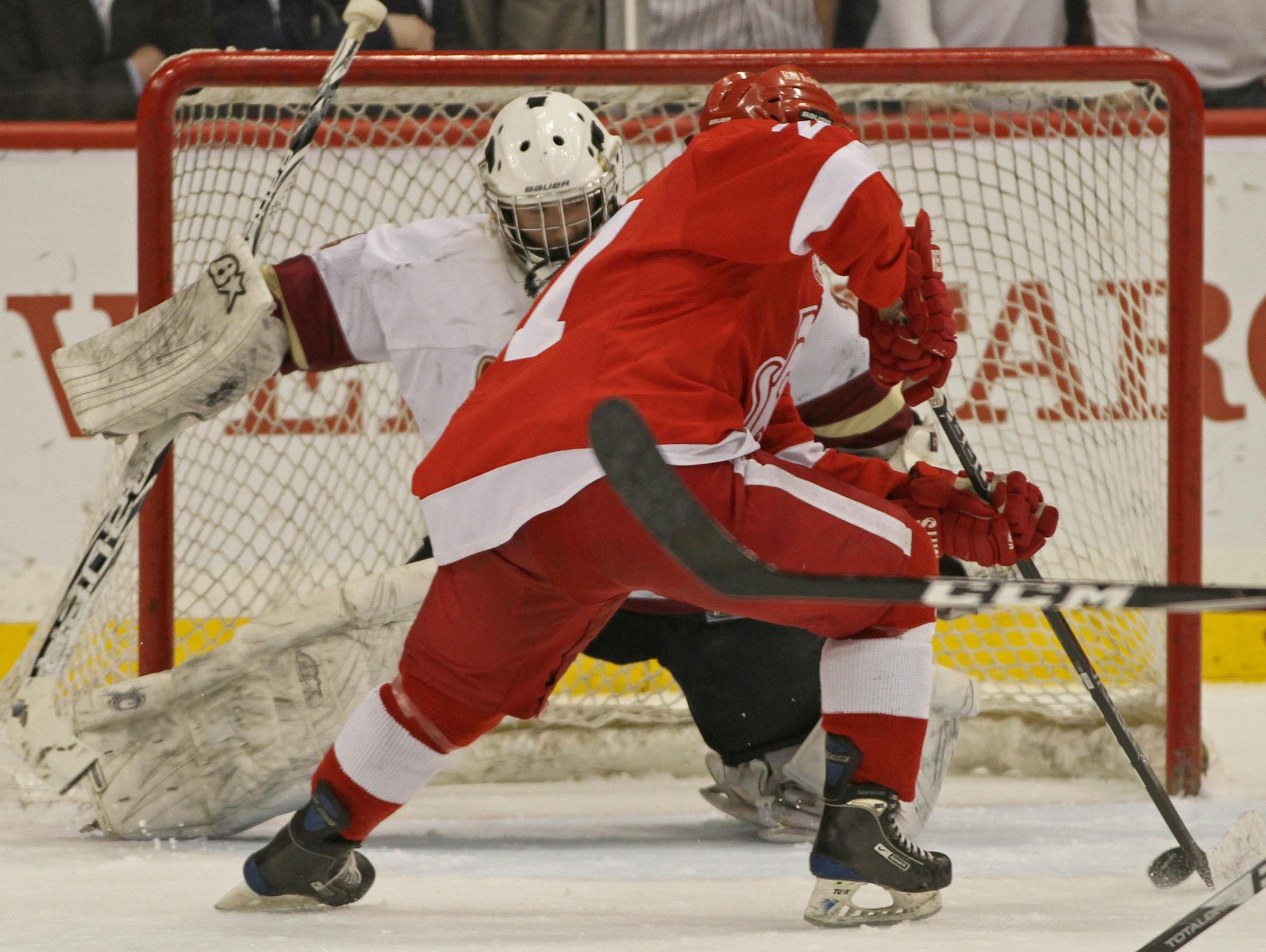Dan Labosky of Benilde-St. Margaret's skated in on Lakeville South goalie Tyler Schumacher and scored a first-period goal in a Class 2A semifinal Friday night. He completed a hat trick in the third period in the Red Knights' 10-1 victory.