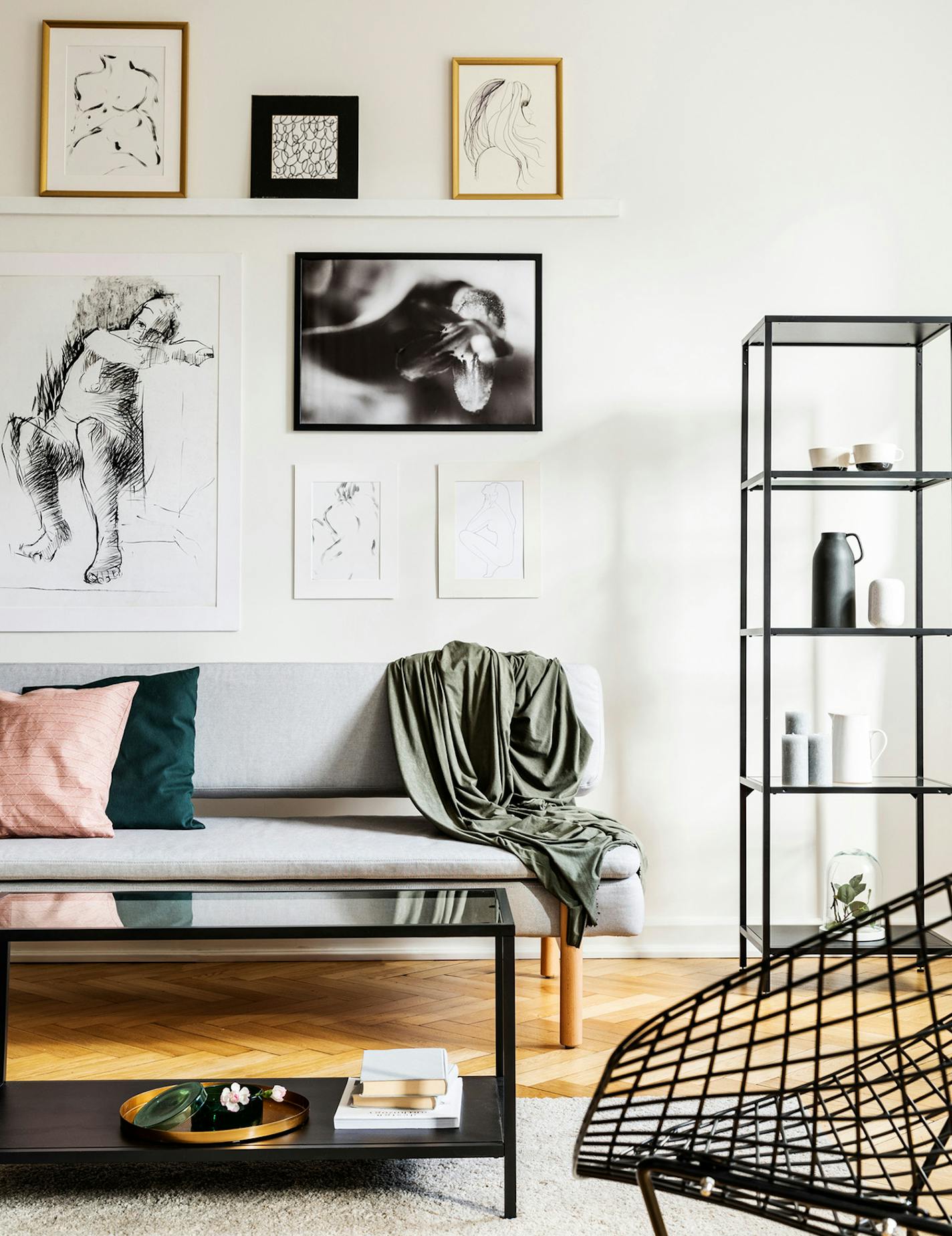 Try arranging a collage of artworks, photos and mirrors on a single wall to create impact in a room. (Katarzyna Bialasiewicz/Dreamstime/TNS)