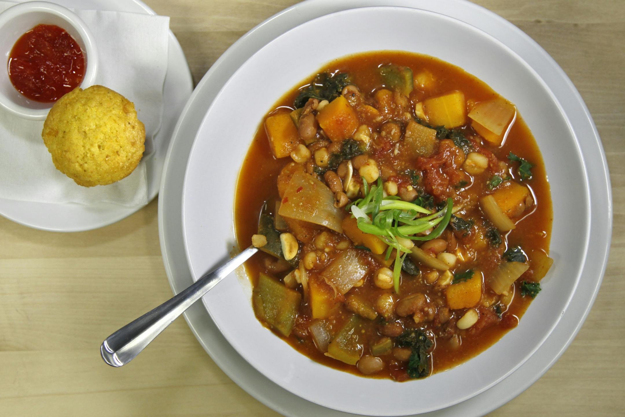 The Trinity stew: squash, pinto beans, kale and hominy, with corn bread and pepper jelly.