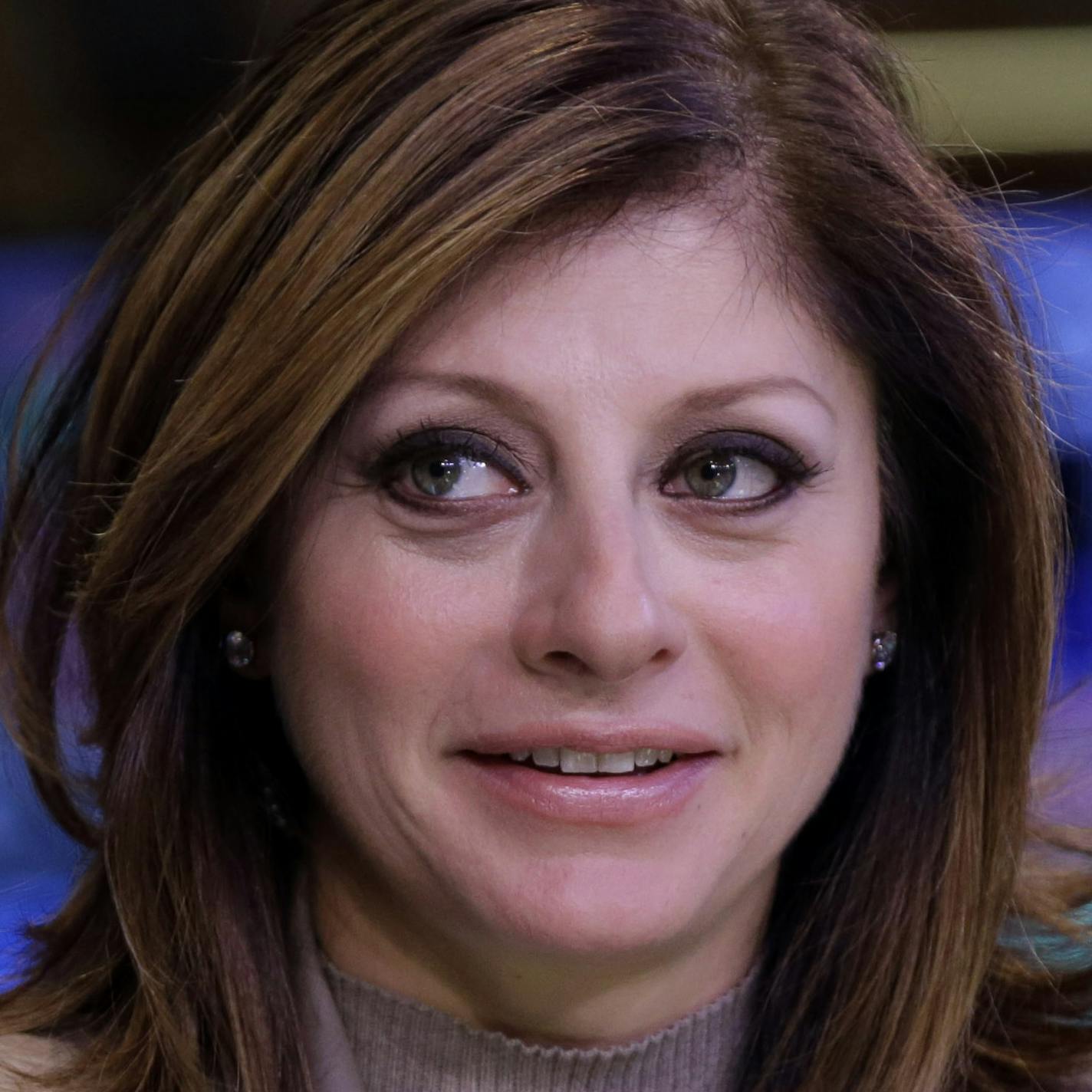 CNBC reporter Maria Bartiromo appears during a broadcast on the floor of the New York Stock Exchange, Tuesday, Nov. 19, 2013. CNBC says veteran anchor and reporter Maria Bartiromo is leaving the business news channel after 20 years. (AP Photo/Richard Drew)