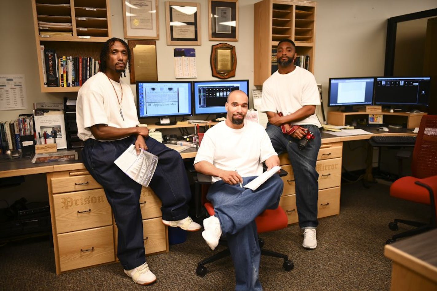 From left, Lennell Martin, Jeffery Young and Ronald Greer, co-editors of the Prison Mirror and inmates at the Stillwater Correctional Facility, sat for a portrait in their newsroom Wednesday.