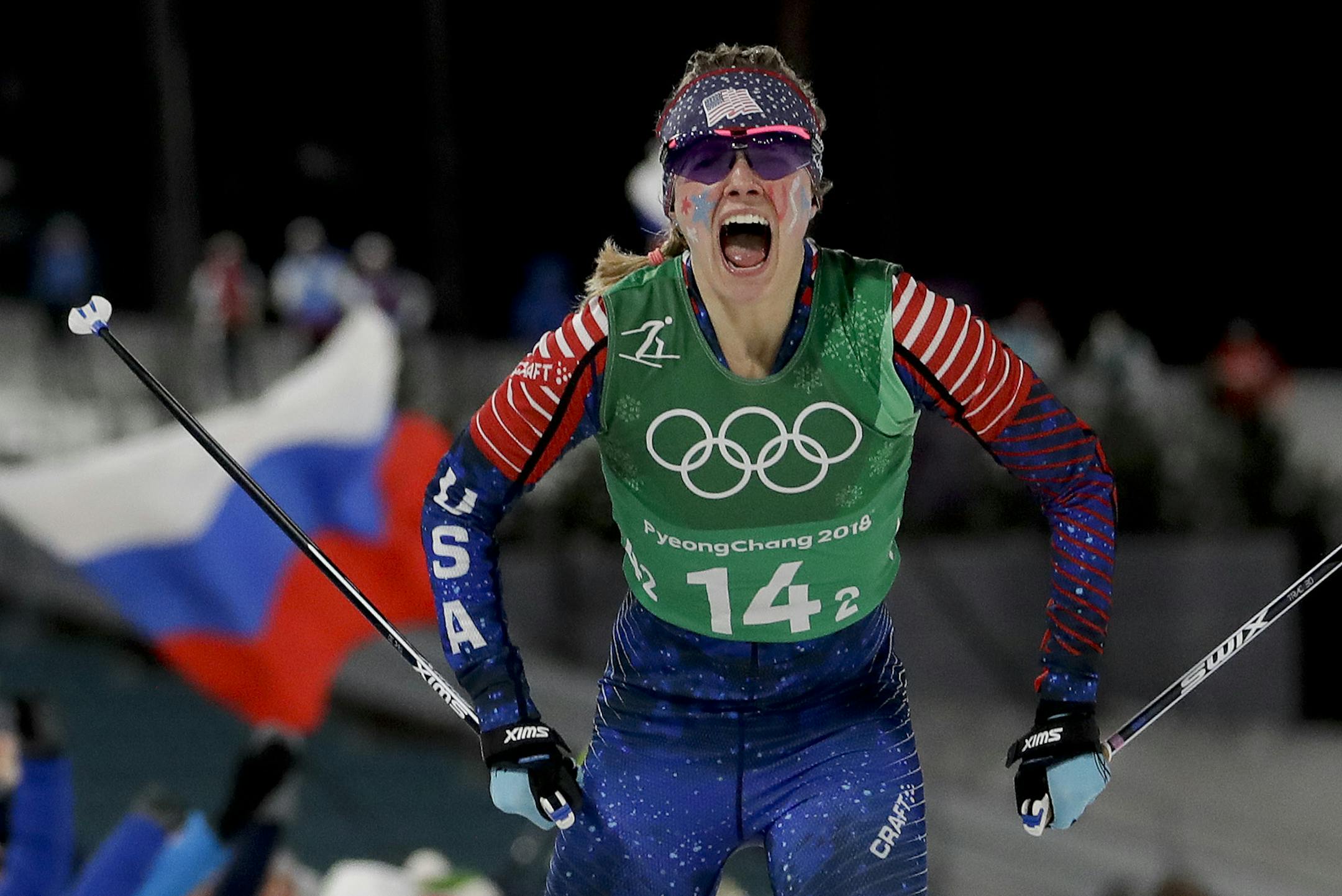 Jessica Diggins, of the United States, celebrates after winning the gold medal in the during women's team sprint freestyle cross-country skiing final at the 2018 Winter Olympics in Pyeongchang, South Korea, Wednesday, Feb. 21, 2018. (AP Photo/Matthias Schrader)