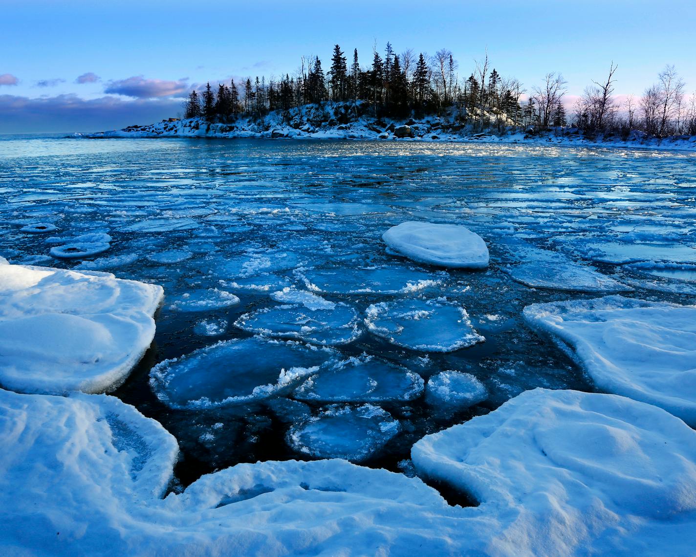 Pancake ice develops in the bay near Cove Point along Lake Superior.