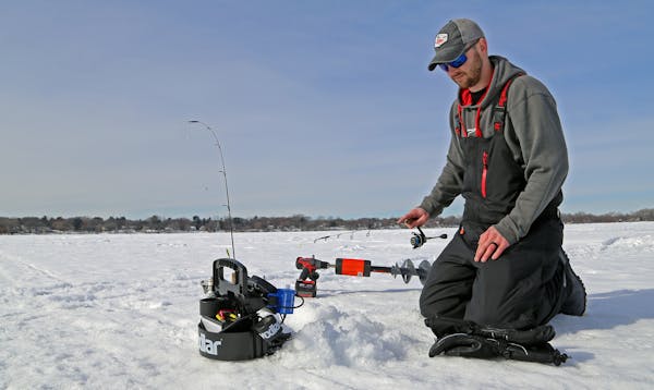 Dominic Schneider jigged last week on an east metro lake, looking for bluegills. The DNR hopes to implement a plan o increase the average size of blue