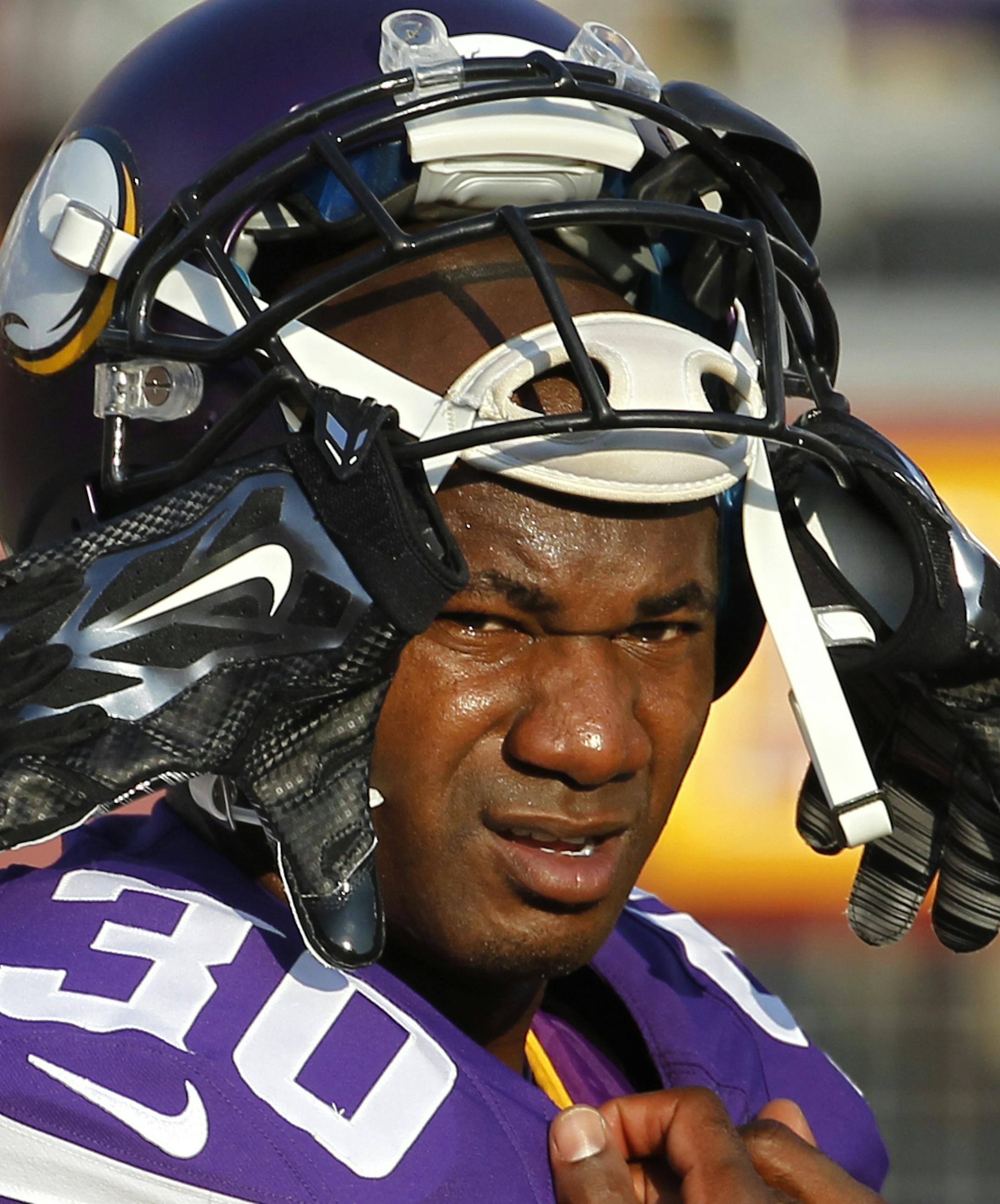 FILE - In this Aug. 15, 2015, file photo, Minnesota Vikings defensive back Terence Newman (30) watches during an preseason NFL football game against the Tampa Bay Buccaneers at TCF Bank Stadium in Minneapolis. Terrence Newman followed Mike Zimmer to Minnesota, and the 37-year-old cornerback has validated the faith his coach has shown in him. He was named NFC defensive player of the week for his two-interception game against Oakland.(AP Photo/Ann Heisenfelt, File) ORG XMIT: MIN2015112419255843