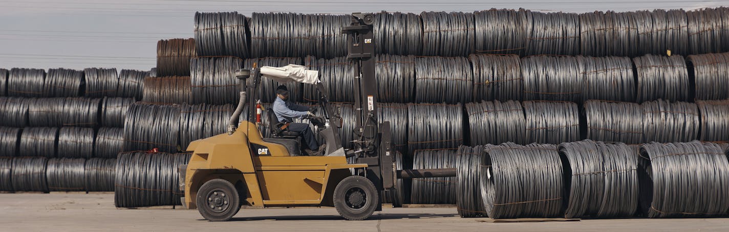 Bales of raw steel imports sit in an outdoor storage yard at the Insteel Industries factory in Houston, March 2, 2018. With the prospect of higher steel prices, the company fears losing business to foreign competitors paying less for raw materials. (Todd Spoth/The New York Times)