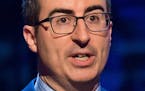FILE - In this Feb. 28, 2015 file photo, John Oliver speaks at Comedy Central's "Night of Too Many Stars: America Comes Together for Autism Programs" 