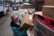 Marti Gudmundson pulled boxes of pie crusts from pallets in the alley behind Harvest of the Heart food pantry in south Minneapolis. She found out abou