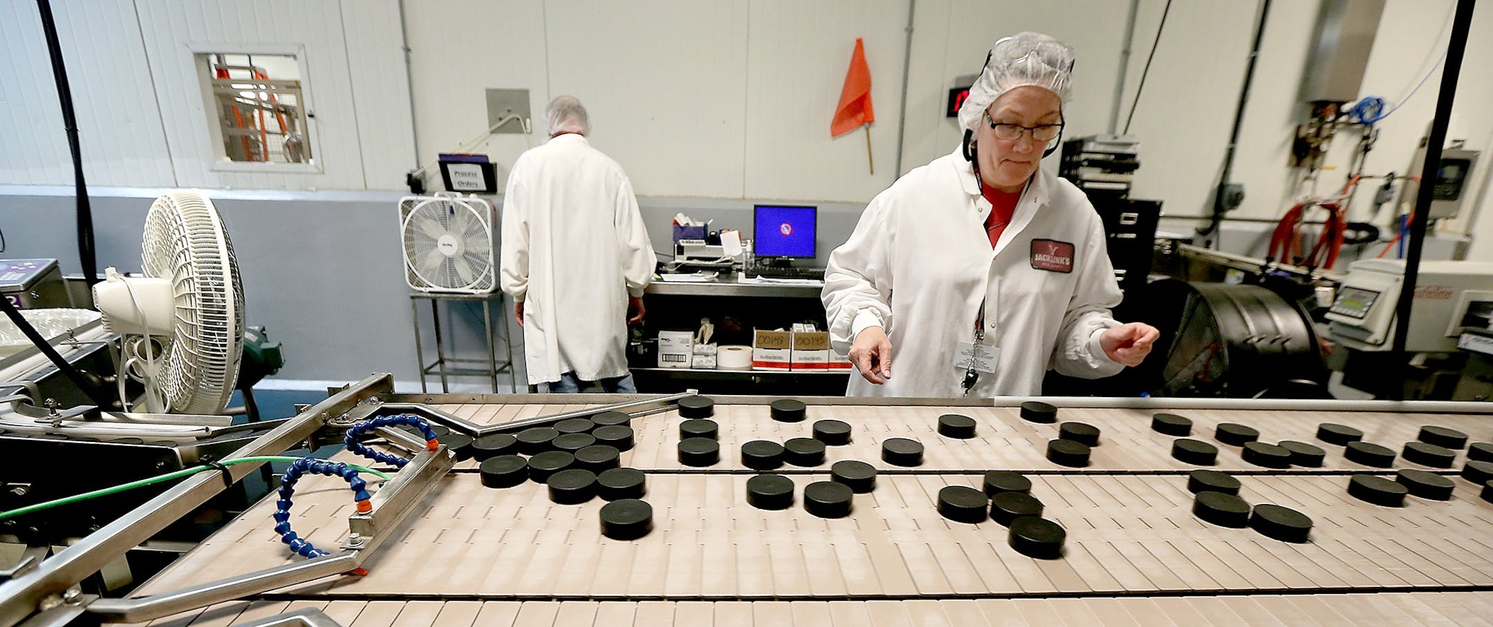 Workers processed Jack Links beef jerky in the packaging area, Monday, October 19, 2015 in Minong, Wis.