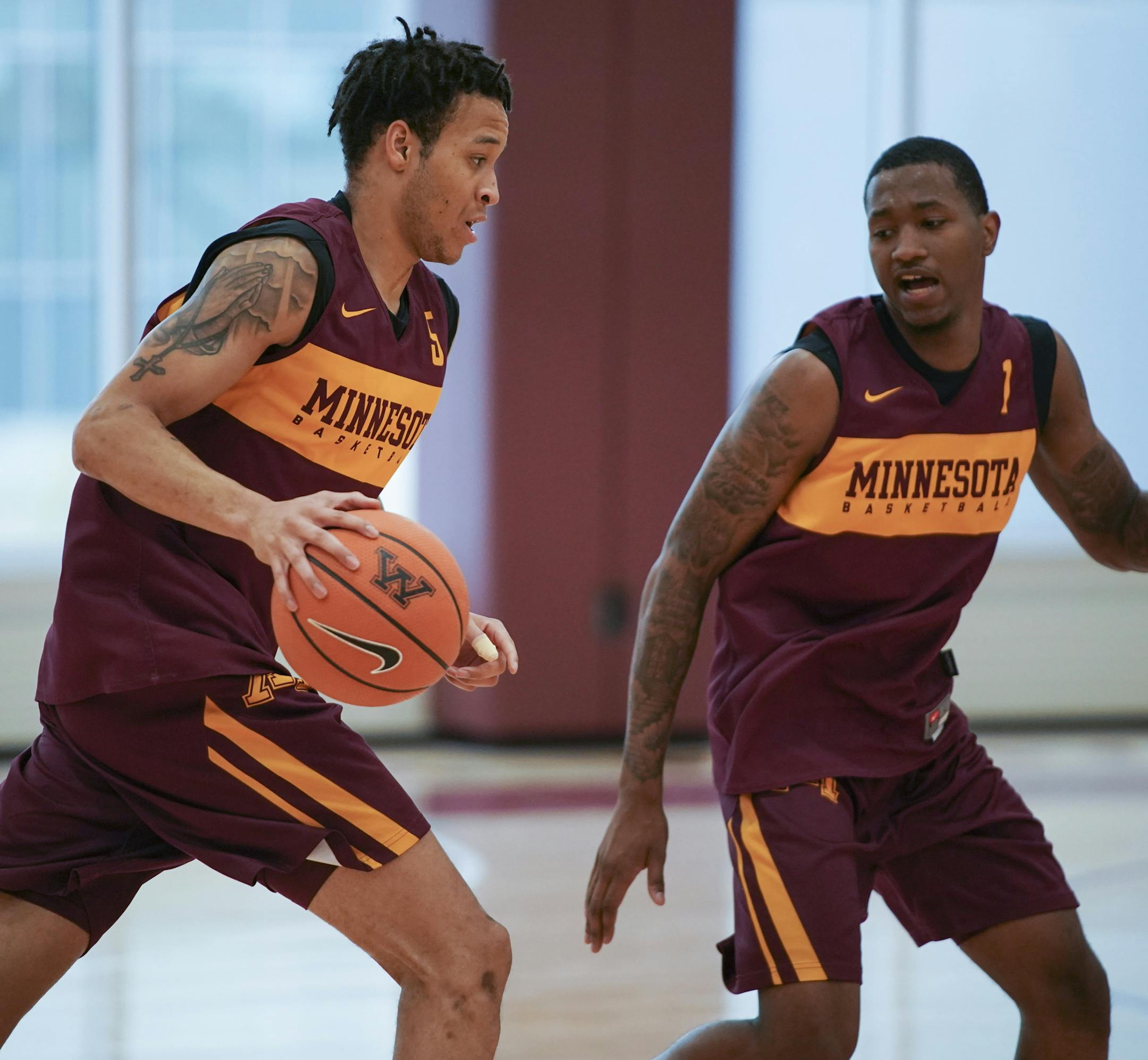 Guards Amir Coffey, left, and Dupree McBrayer, both coming off injuries from last season, took part in a drill during practice Tuesday afternoon. ] JEFF WHEELER &#xef; jeff.wheeler@startribune.com The University of Minnesota men's basketball team practiced Tuesday afternoon, September 25, 2018 at the new basketball facility.