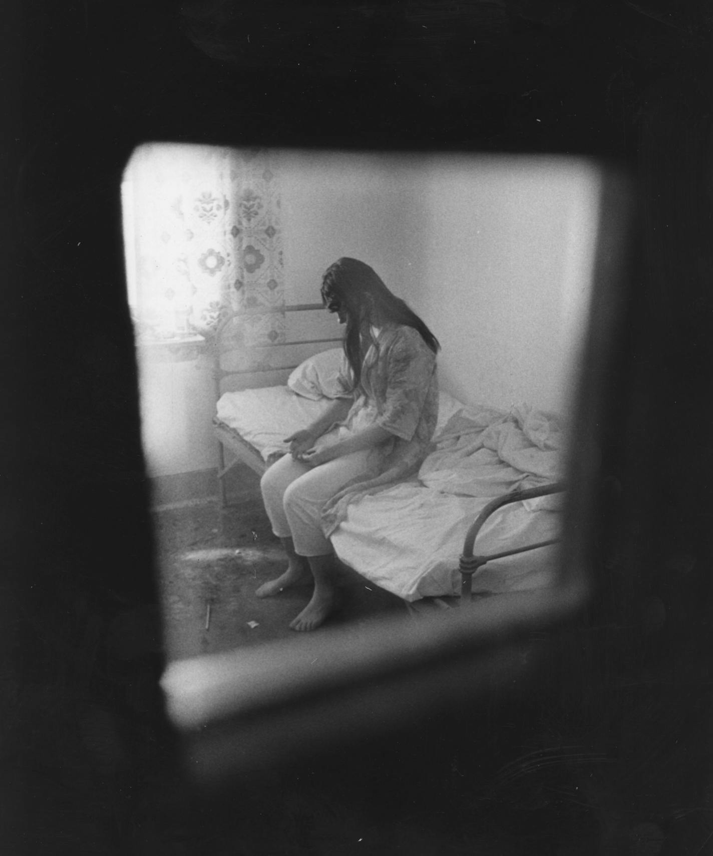 A patient in the Miller Building for Women at the Anoka State Mental Hospital. 1967 photo by Minneapolis Tribune staff photographer Earl Seubert.