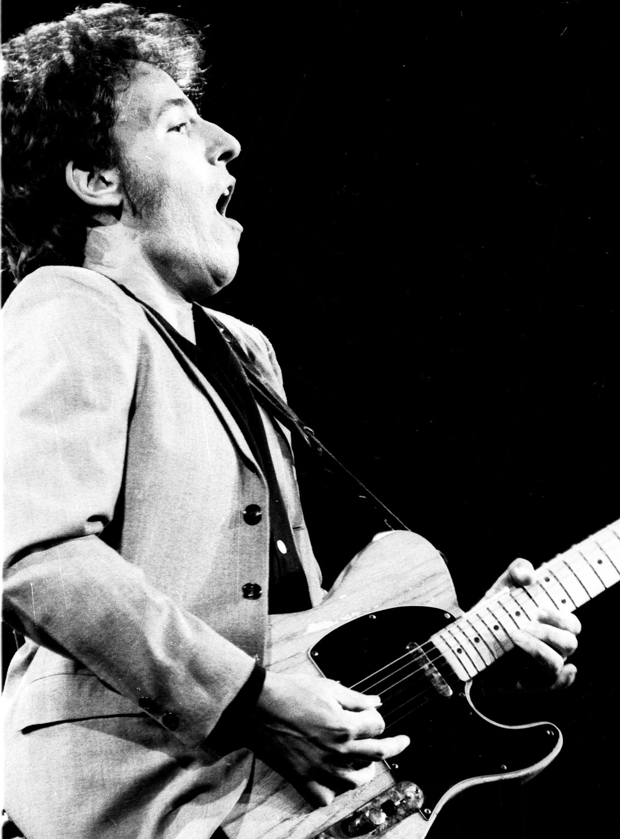 Rock and roll musician Bruce Springsteen sings and plays his guitar at New York's Madison Square Garden during a concert sponsored by Musicians United for Safe Energy (MUSE), Friday night, Sept. 22, 1979. Proceeds from the benefit are to support development of energy sources other than nuclear power. (AP Photo) ORG XMIT: APHS158