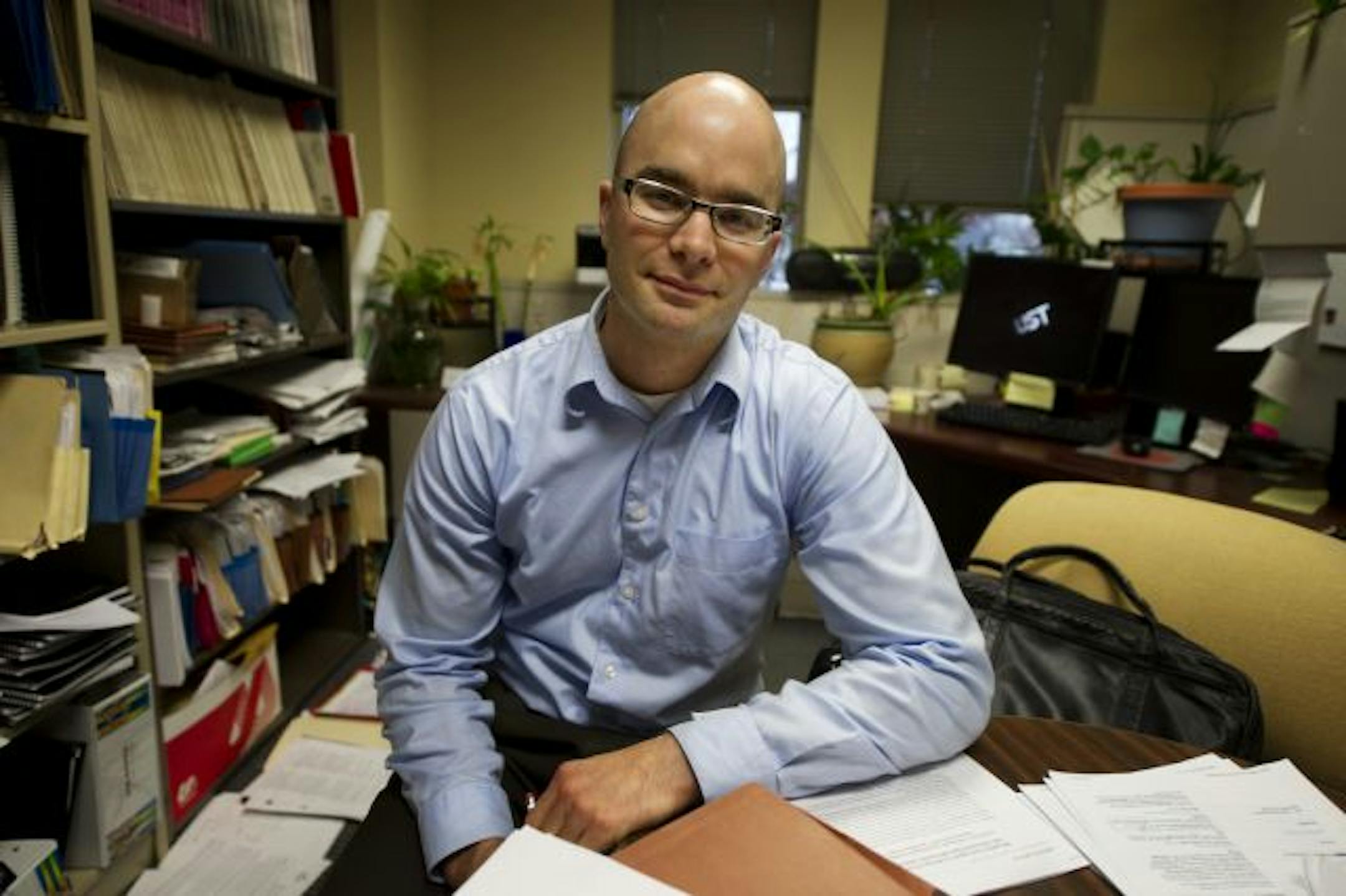 John Abraham, in his University of St. Thomas office, decided that he had to participate in discussions about global warming after hearing a 2009 talk by climate change-denier Lord Christopher Monckton.