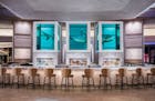 Damien Hirst's sculpture of an 13-foot tiger shark preserved in three tanks floats atop the The Palms' Unkown Bar and also inspired the name of Bobby 