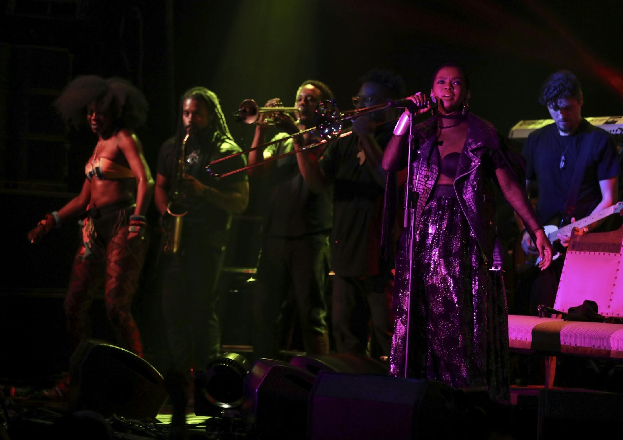 Lauryn Hill on the First Ave. stage with her band early in her set Sunday night.