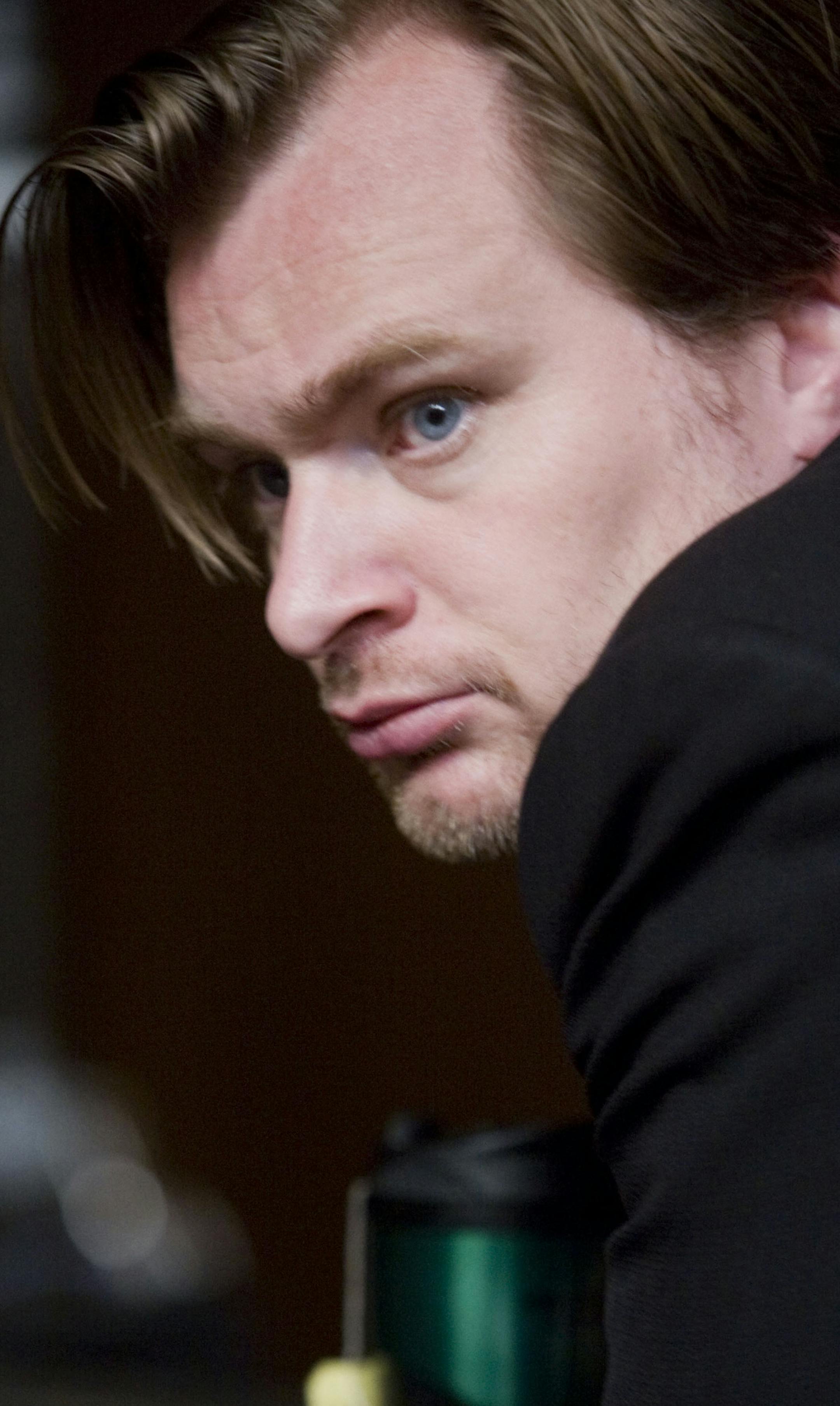 Director CHRISTOPHER NOLAN on the set of Warner Bros. Picturesí and Legendary Picturesí action drama ìThe Dark Knight,î distributed by Warner Bros. Pictures and starring Christian Bale, Michael Caine, Heath Ledger, Gary Oldman, Aaron Eckhart, Maggie Gyllenhaal and Morgan Freeman. PHOTOGRAPHS TO BE USED SOLELY FOR ADVERTISING, PROMOTION, PUBLICITY OR REVIEWS OF THIS SPECIFIC MOTION PICTURE AND TO REMAIN THE PROPERTY OF THE STUDIO. NOT FOR SALE OR REDISTRIBUTION. ALL RIGHTS RES