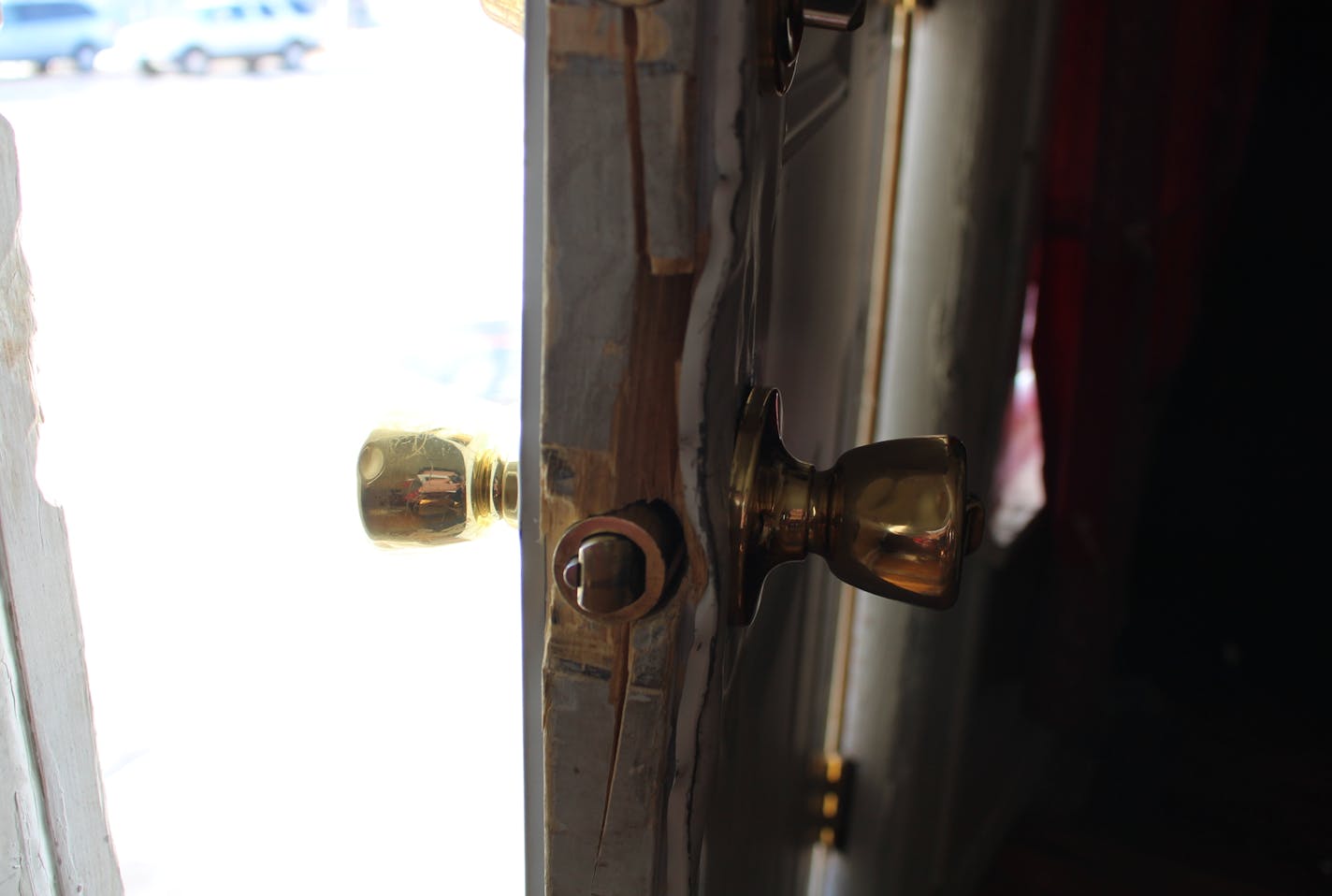 A door hinge at a Mahmood Khan property on Penn Avenue this February.