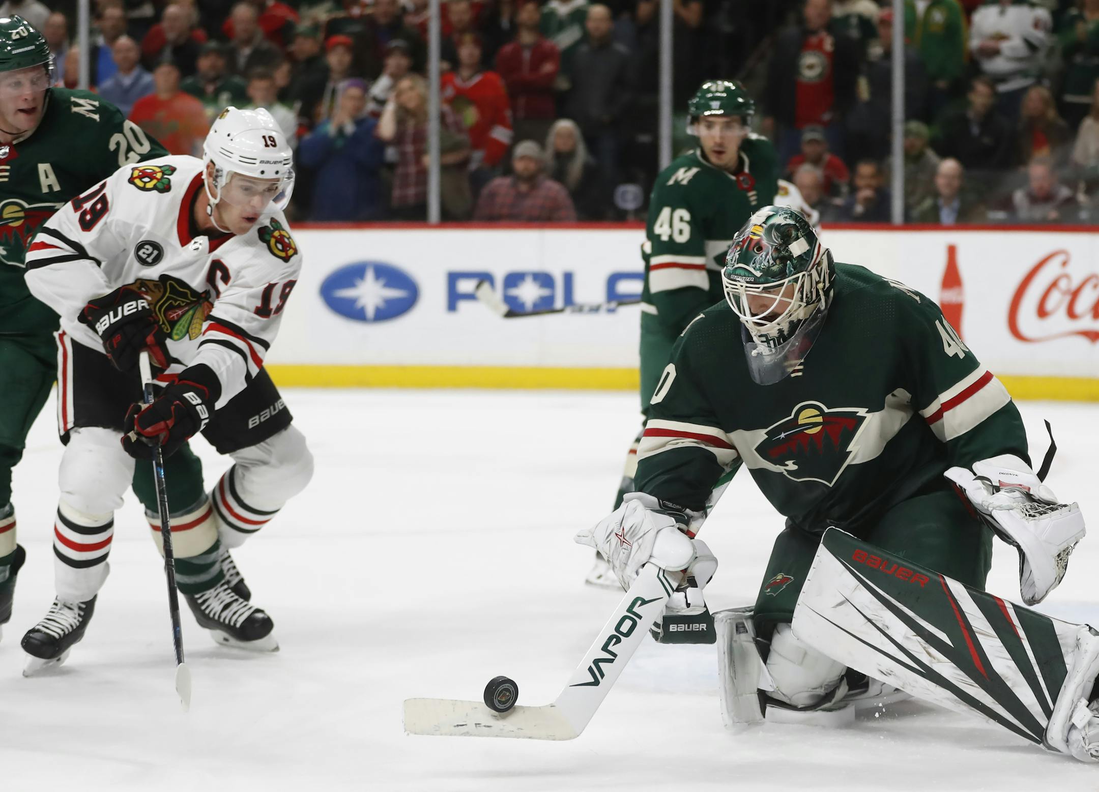 Devan Dubnyk(40) stops an attack by Jonathan Toews(19). ] the Wild take on the Blackhawks at Xcel Center in St. Paul, Minnesota. Richard Tsong-Taatarii&#x2022;Richard.Tsong-Taatarii@startribune.com