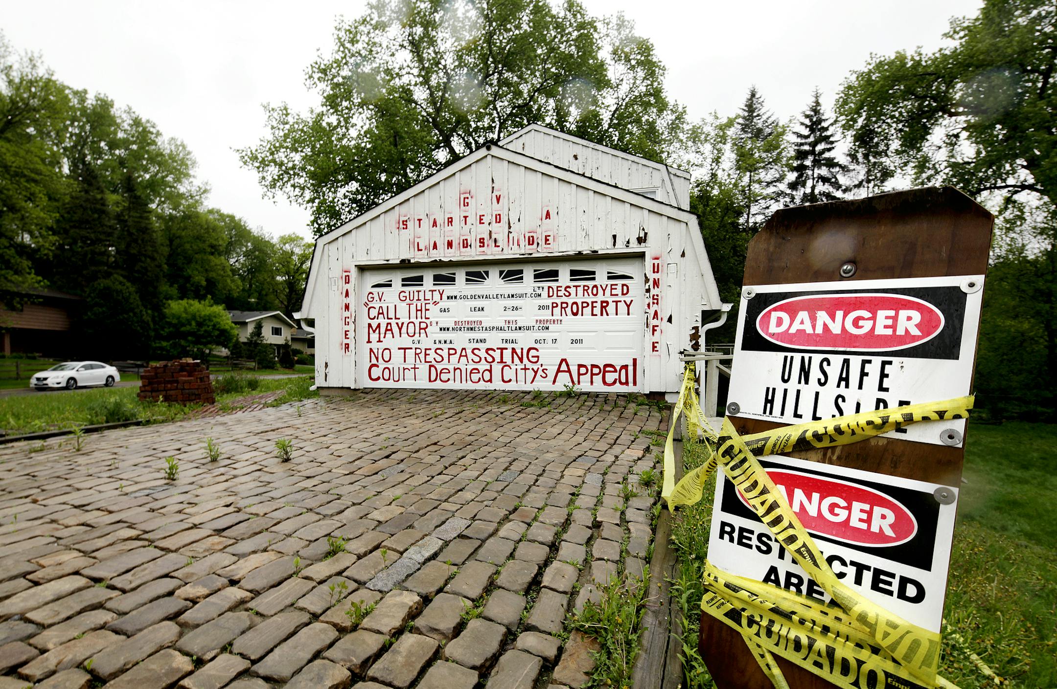 Golden Valley is wrapping up efforts to condemn a home that was damaged during a 2007-08 construction project. The homeowners (the Dargis) have won 3 appeals in court and will be paid by the city to reclocate summer. Golden Valley, MN on May 22, 2013. ] JOELKOYAMA‚Ä¢joel koyama@startribune.com Summary: MAGIC SAXO NUMBER IS 549494 Golden Valley is wrapping up efforts to condemn a home that was damaged during a 2007-08 construction project. The homeowners (the Dargis) have won 3 a