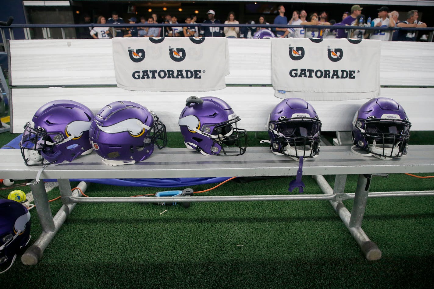 Minnesota Vikings helmets sit on the bench before an NFL football game against the Dallas Cowboys in Arlington, Texas, Sunday, Nov. 10, 2019. (AP Photo/Michael Ainsworth)