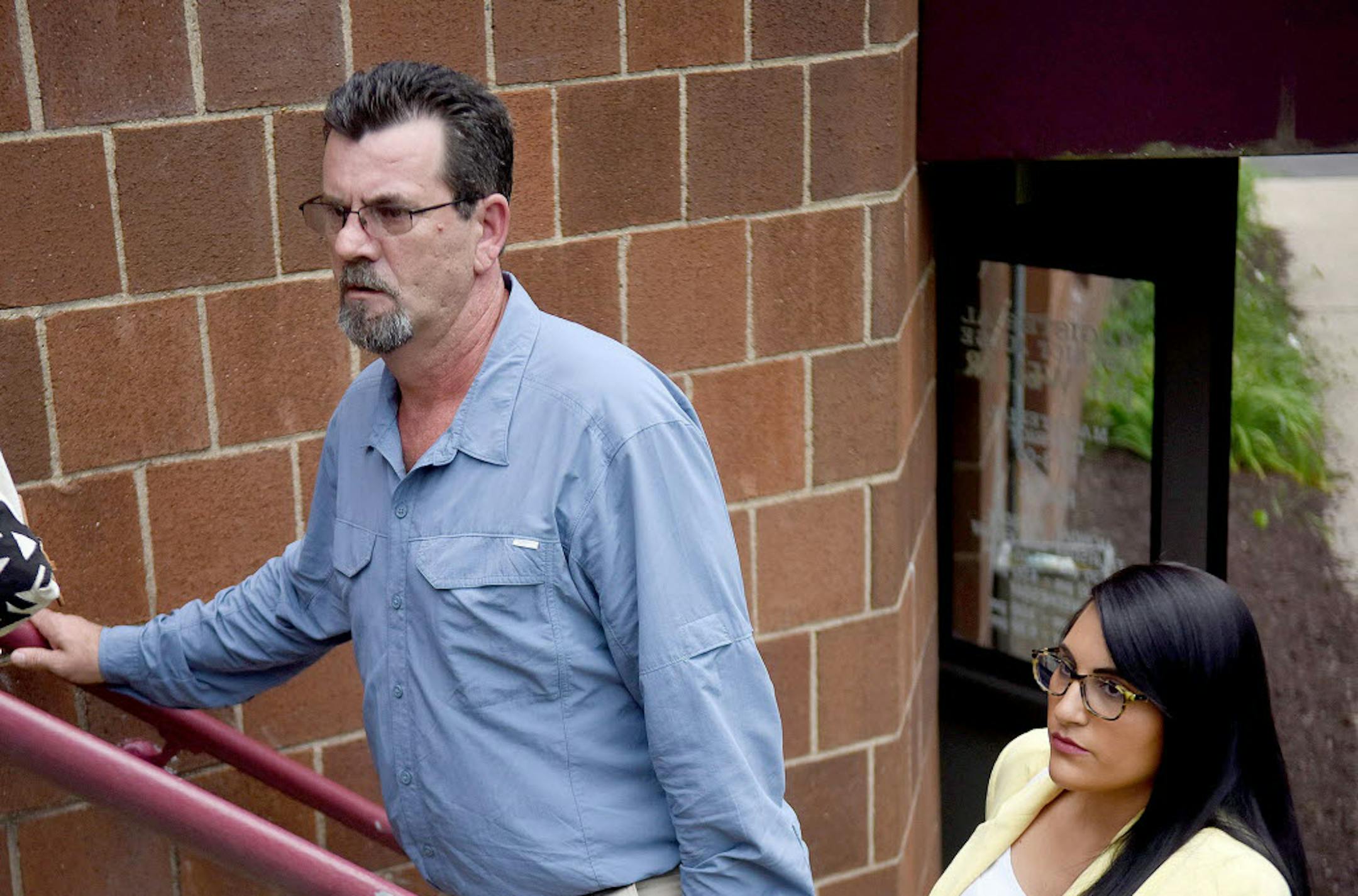 In this July 26, 2016 photo, Kevin Lee Ewing, left, leaves with one of his attorneys after a preliminary hearing with District Judge Jay Weller in Canonsburg, Pa.