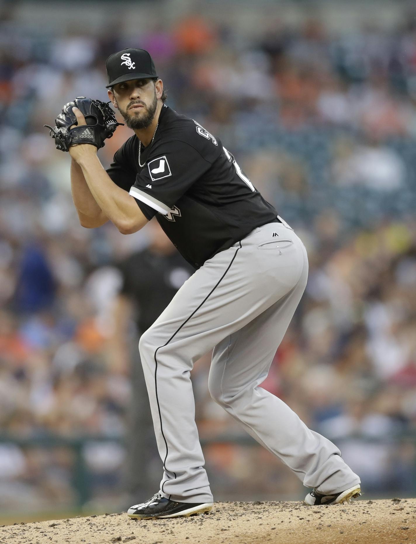 Chicago White Sox starting pitcher James Shields looks towards first base during the third inning of a baseball game against the Detroit Tigers, Monday, Aug. 29, 2016, in Detroit. (AP Photo/Carlos Osorio)