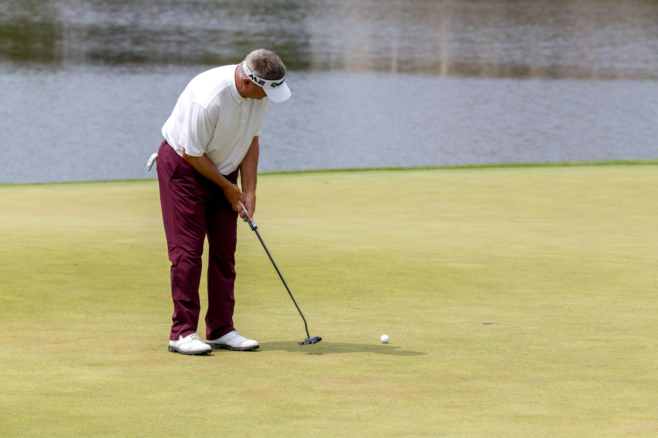 Paul Goydos putts on the ninth hole during round two of the 3M Championship at TPC Twin Cities on Saturday. Goydos and Kenny Perry are the two leaders for round two. ] COURTNEY PEDROZA � courtney.pedroza@startribune.com; Second day of 3M Golf Tournament at TPC Twin Cities in Blaine, on Saturday, Aug. 5, 2017; Second Round of Championship Play;
