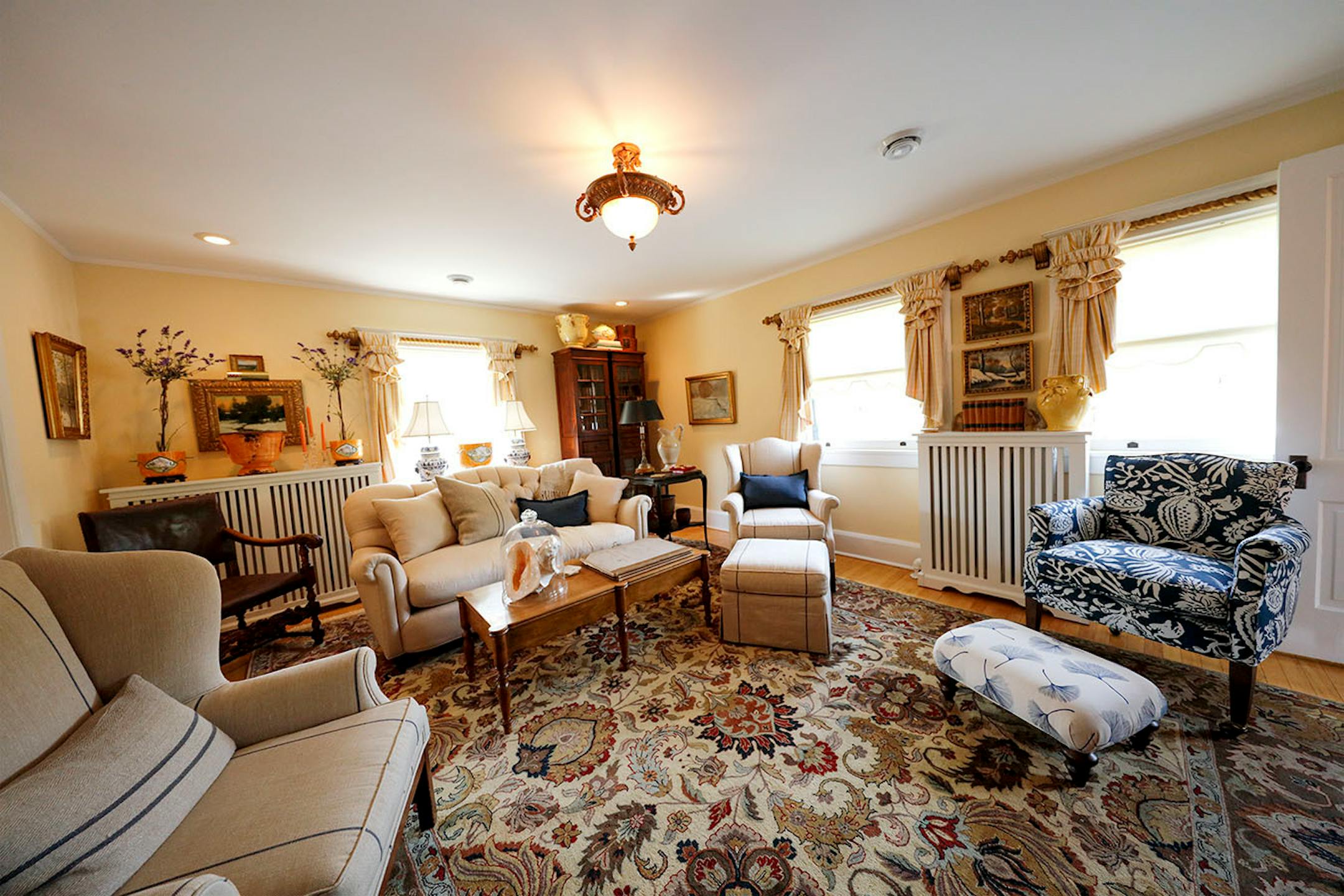 An upstairs living room inside the carriage house, now a guest house.