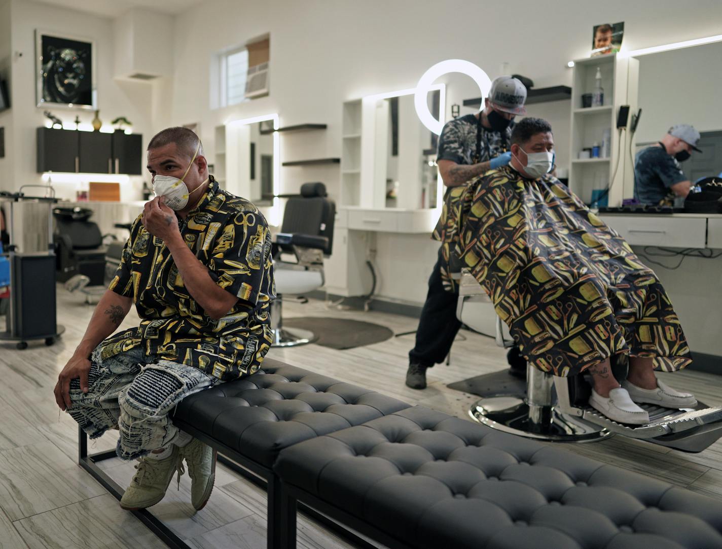 Twin Cities salons and barbershops have begun to open Monday with limited capacity. Here, On Monday morning Javier Soliz (left) reopened VIP Cutz barbershop in St. Paul and welcomed customers one at a time. Barber Lance Flemino (right) cut a customers hair in the early afternoon. brian.peterson@startribune.com St. Paul, MN Monday, June 1, 2020 brian.peterson@startribune.com St. Paul, MN Monday, June 1, 2020