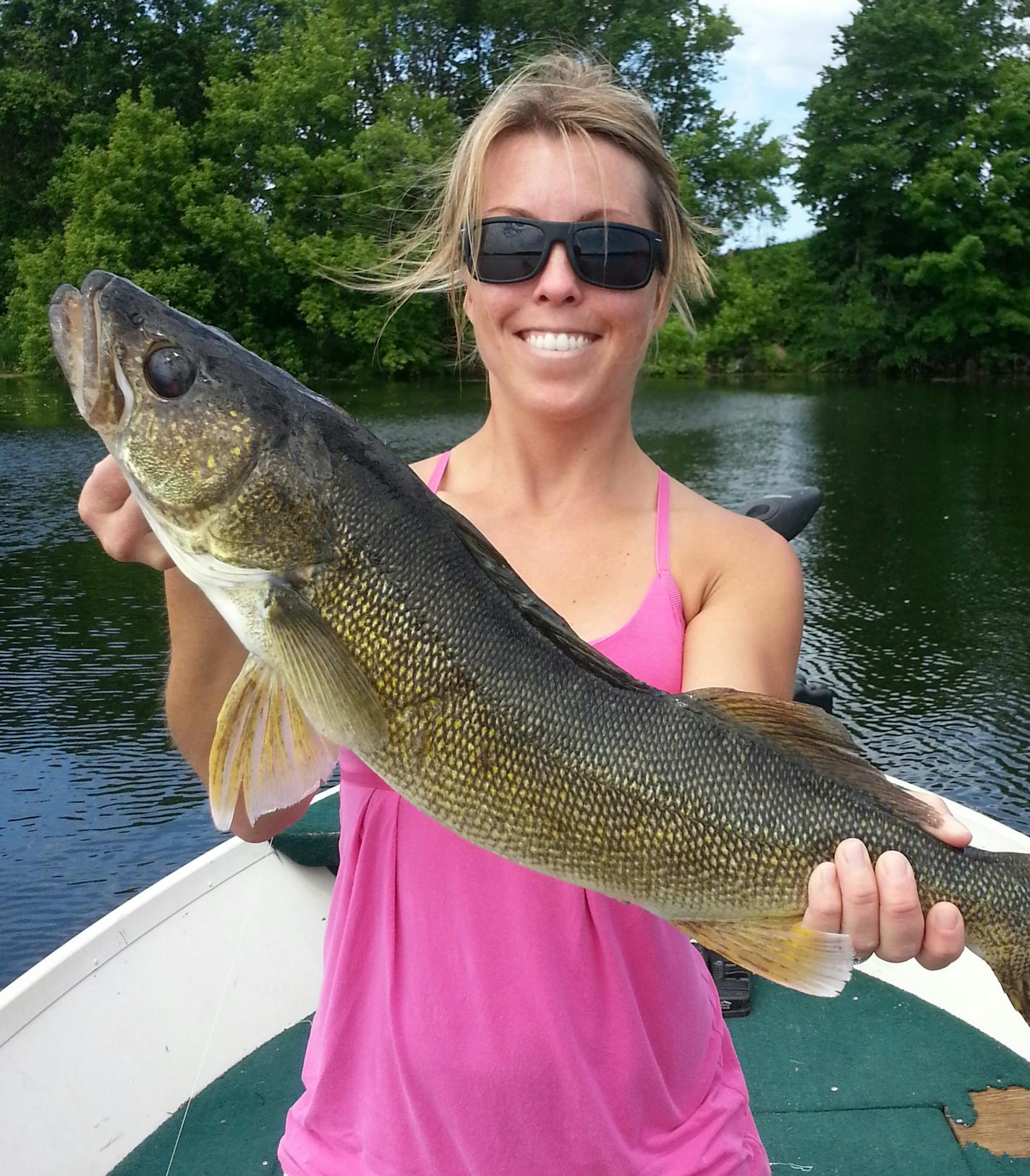 Brittany Wilson, from Otsego, was bass fishing with a bright neon yellow artificial when she landed this healthy 24-inch walleye.