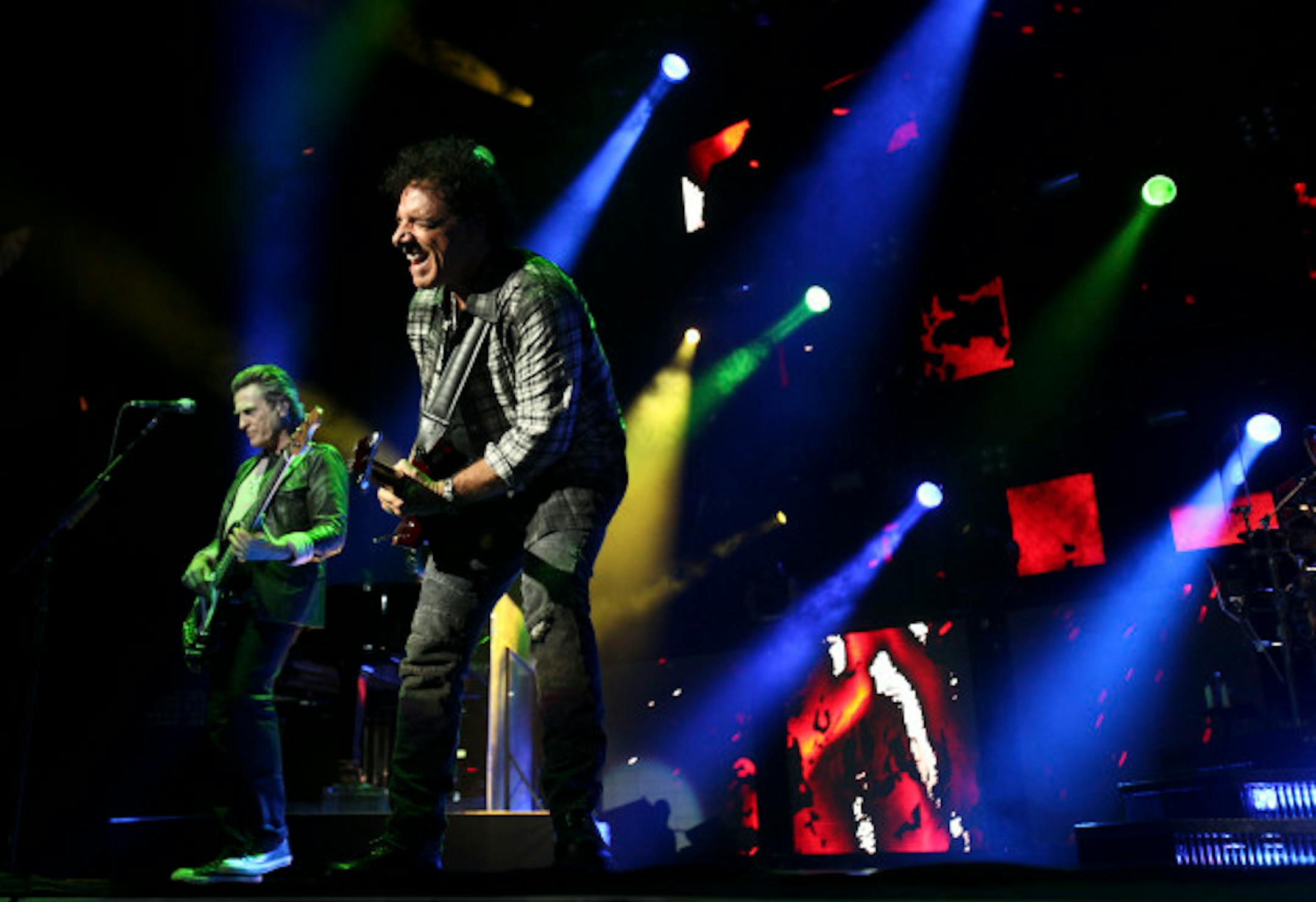 Journey leader Neal Schon, center, and original bassist Ross Valory played Xcel Energy Center in 2011 and many prior years. / Star Tribune file