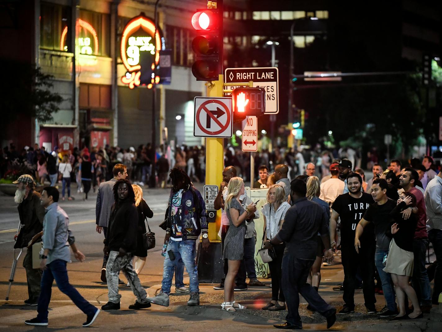 The busy post-closing time scene along Hennepin Avenue early Sunday morning.