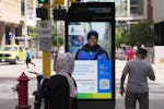 A new touch screen kiosk, one of several, sits at the intersection of Nicollet Mall and 5th Street to help people find their way to any number of plac