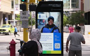 A new touch screen kiosk, one of several, sits at the intersection of Nicollet Mall and 5th Street to help people find their way to any number of plac