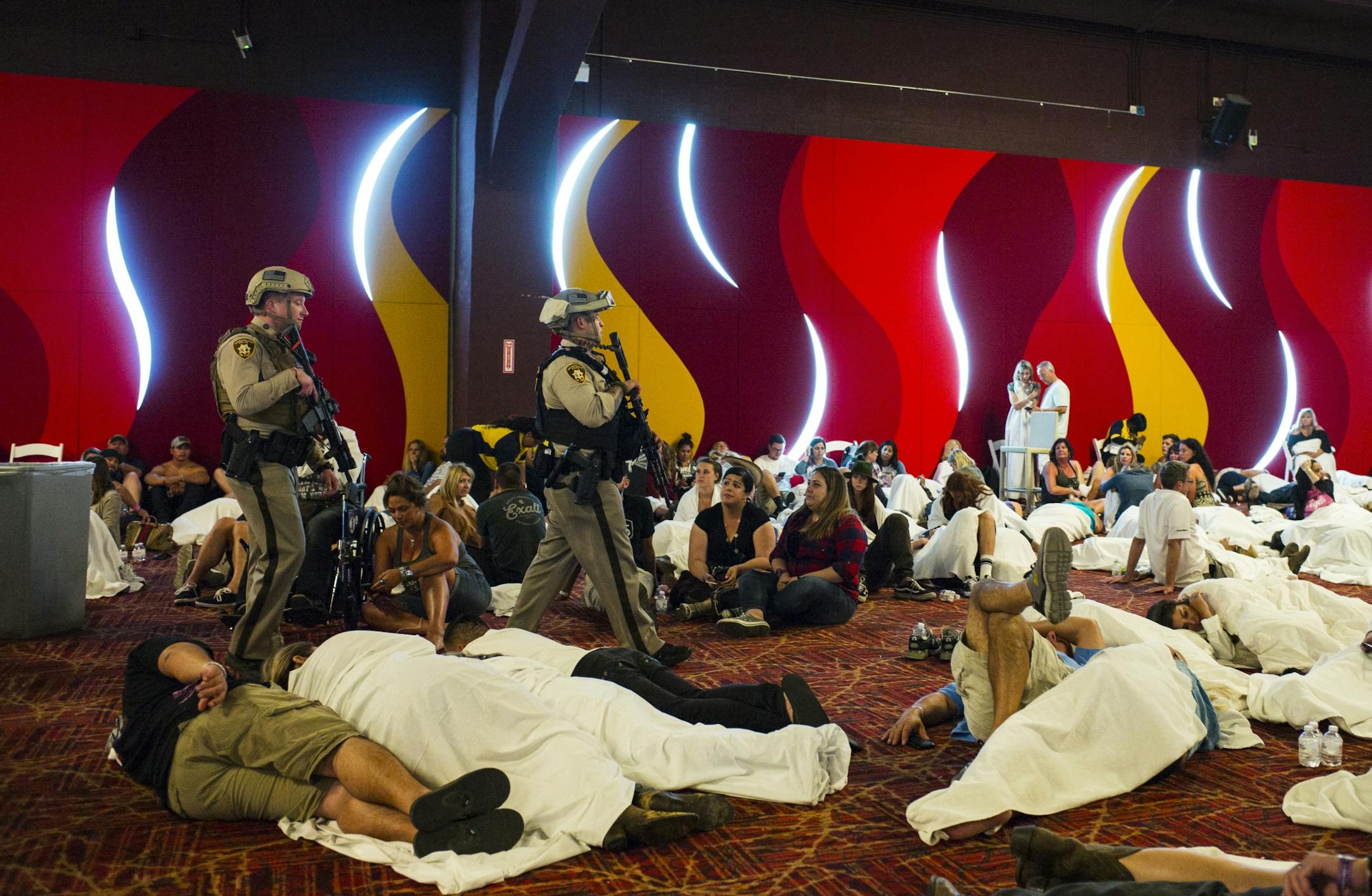 Las Vegas police sweep through a convention center area during a lockdown Monday at the Tropicana Las Vegas following an active shooter situation on the Las Vegas Strip.