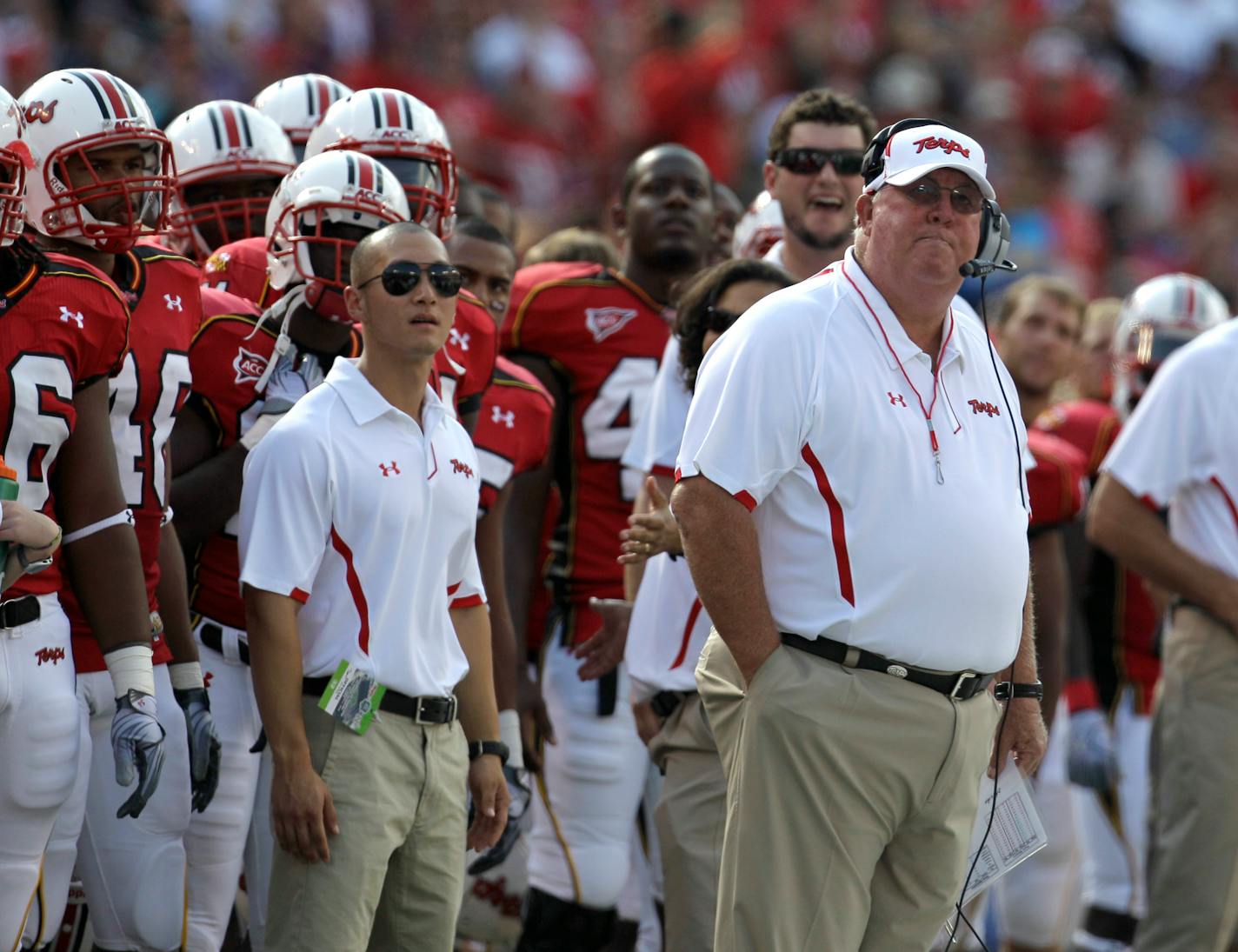 In this Sept. 6, 2010, photo, Maryland coach Ralph Friedgen, right, looks on from the sidelines during the first half of an NCAA college football game against Navy in Baltimore. Friedgen was fired as as coach Monday, Dec. 20, 2010, effective after the Military Bowl on Dec. 29. (AP Photo/Rob Carr)