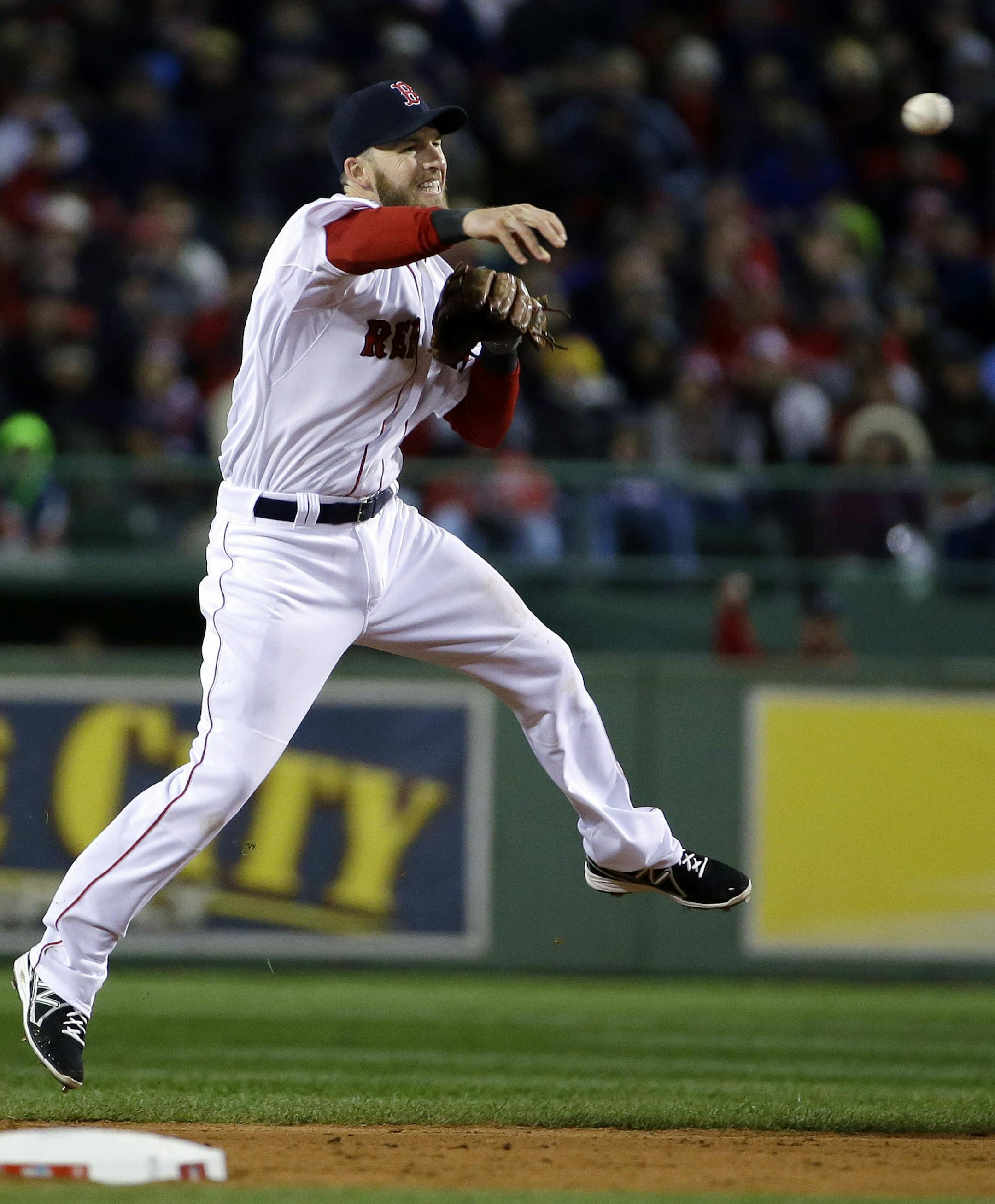 Boston Red Sox's Stephen Drew throws out St. Louis Cardinals' Daniel Descalso during the fifth inning of Game 2 of baseball's World Series Thursday, Oct. 24, 2013, in Boston. (AP Photo/Matt Slocum) ORG XMIT: WS193